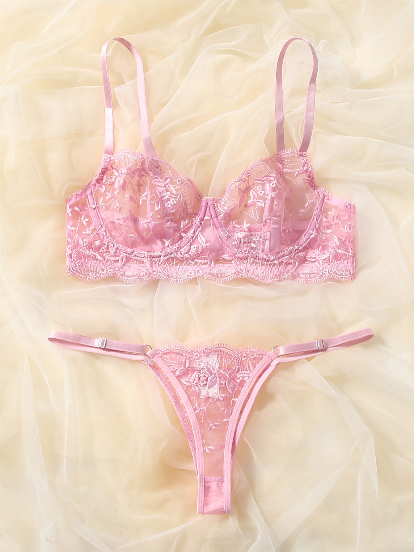Pink semi-sheer mesh lingerie set with leaf embroidery, underwire demi bra, adjustable spaghetti straps, and matching low-rise V-string panty