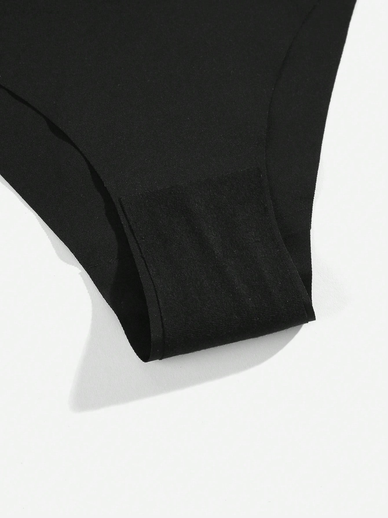 Women's black plain mid rise briefs with criss cross detail, medium stretch fabric, and casual daily maternity underwear style