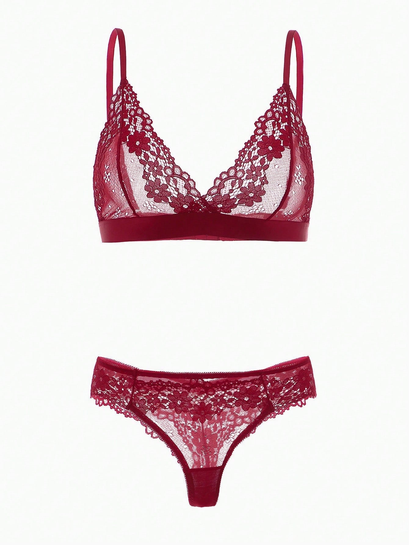 Black floral lace lingerie set featuring a wireless bralette with adjustable straps, sheer contrast lace, cut-out details, and a matching low-rise thong.