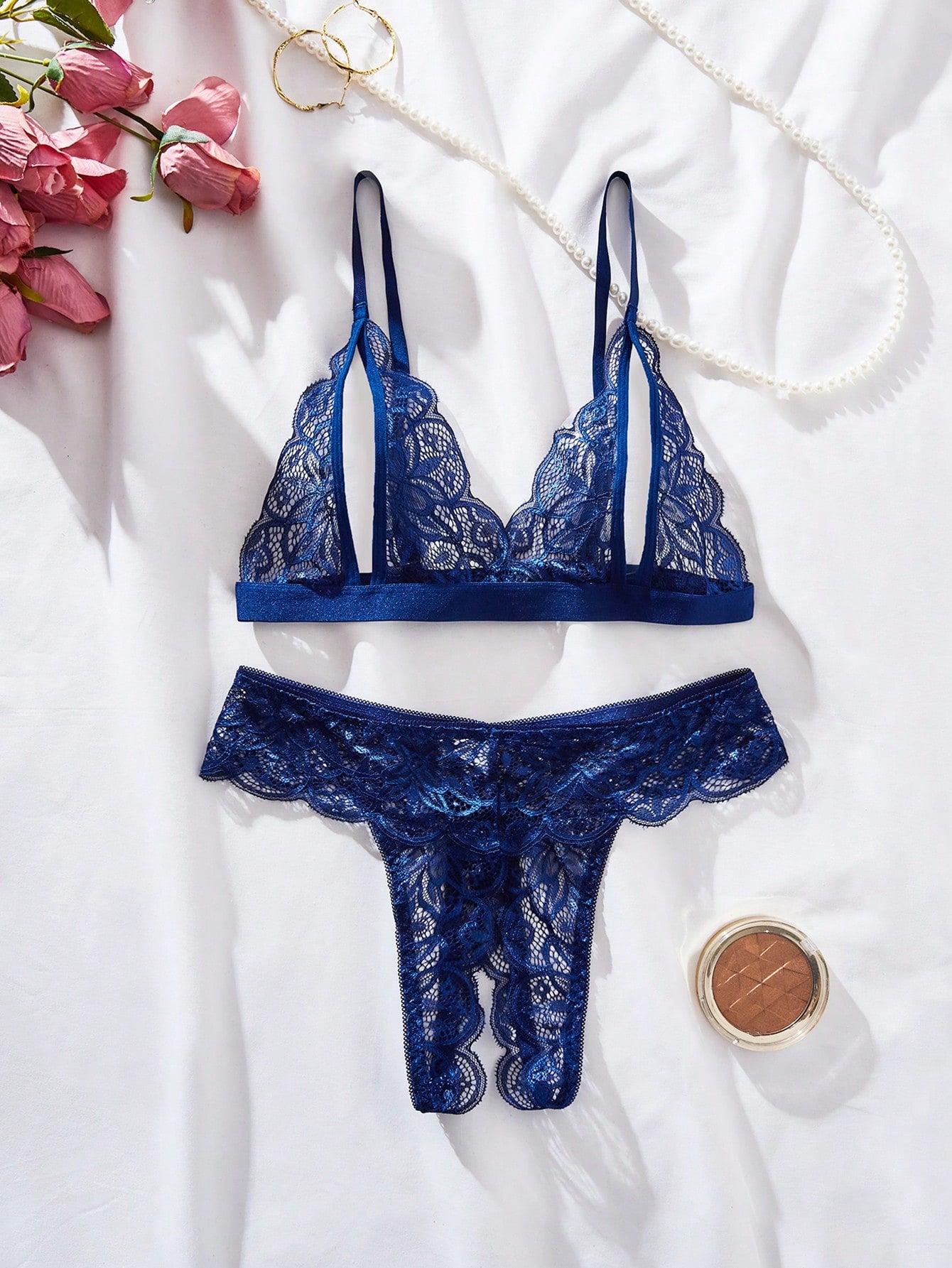 Burgundy floral lace lingerie set with scallop trim, cut-out detail, adjustable spaghetti straps, a bralette-style top, and mid-rise thong bottoms.