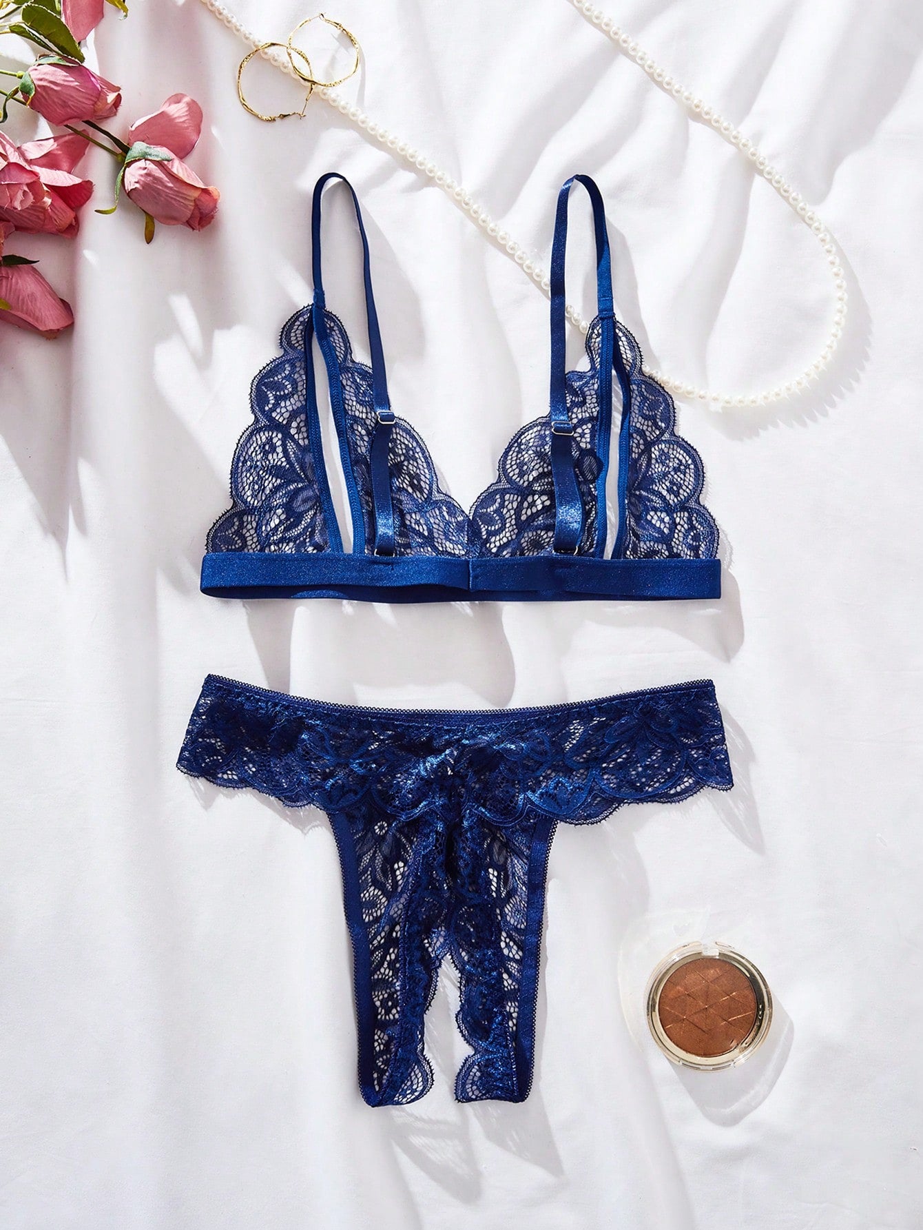 Burgundy floral lace lingerie set with scallop trim, cut-out detail, adjustable spaghetti straps, a bralette-style top, and mid-rise thong bottoms.
