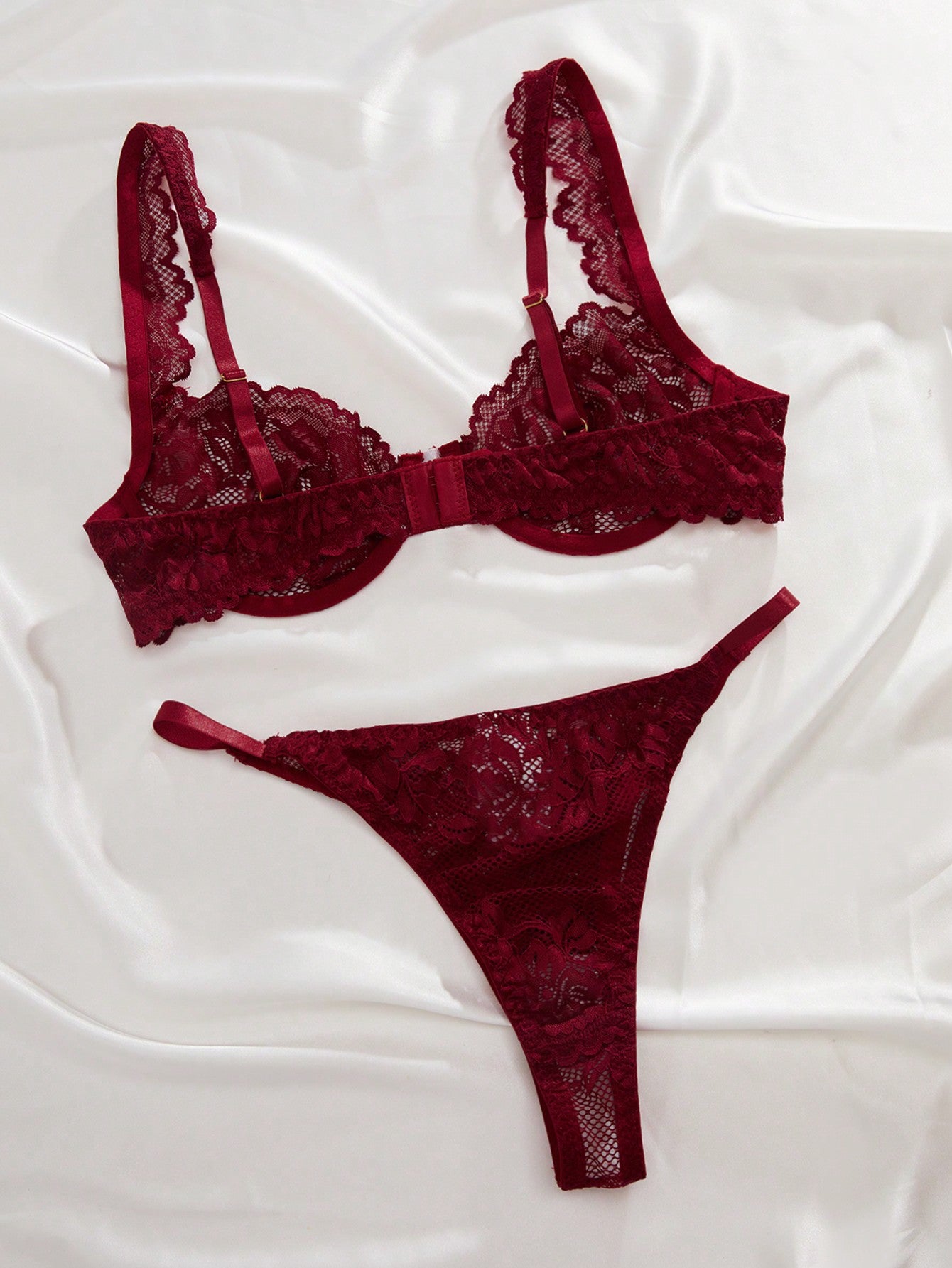 Two-piece floral lace lingerie set featuring an underwire bra with adjustable straps and a sweetheart neckline, paired with a low-rise thong.