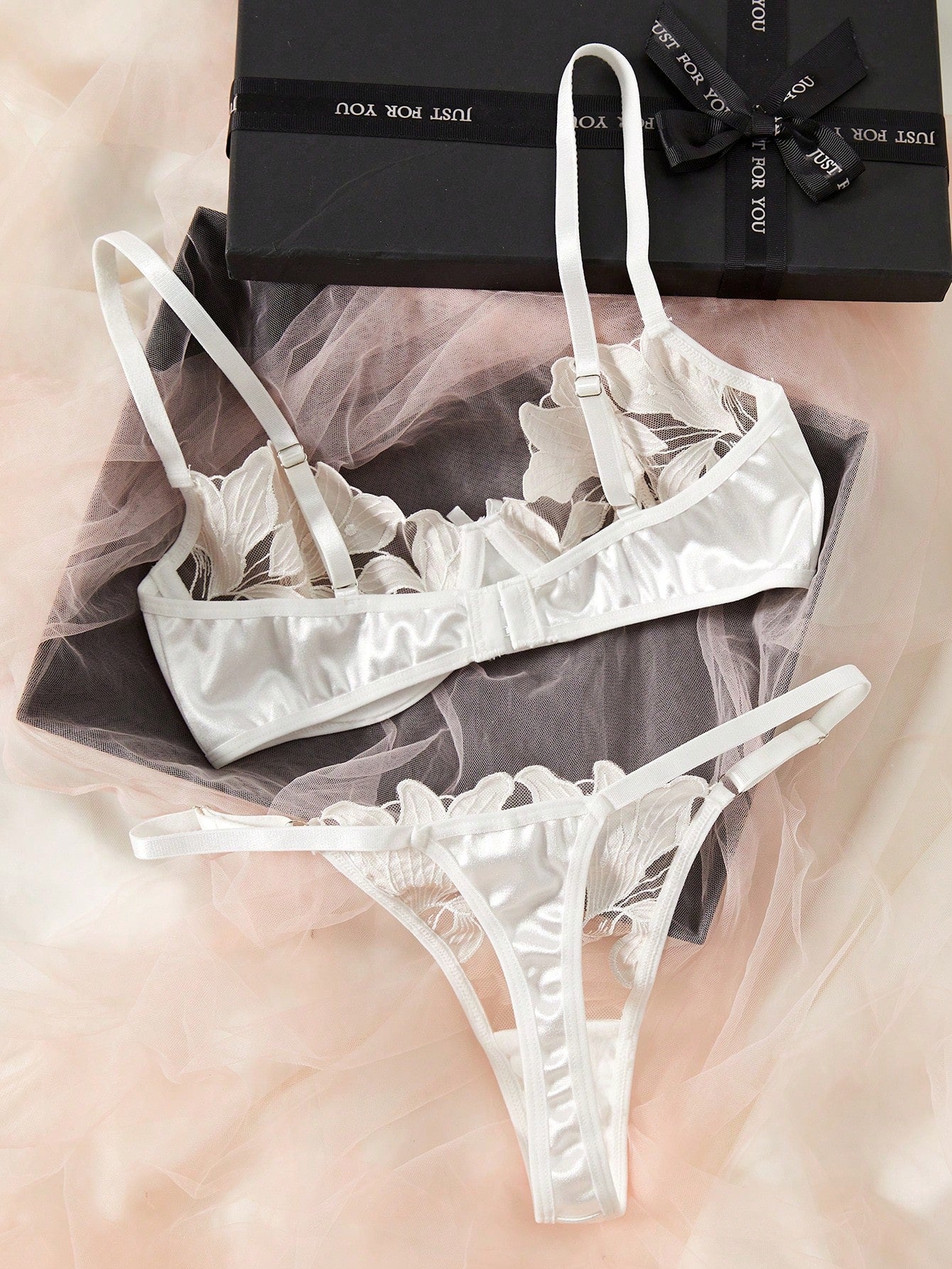 Women’s 2-piece sexy lingerie set featuring an embroidered sheer mesh demi bra with adjustable spaghetti straps and a matching low-rise thong.