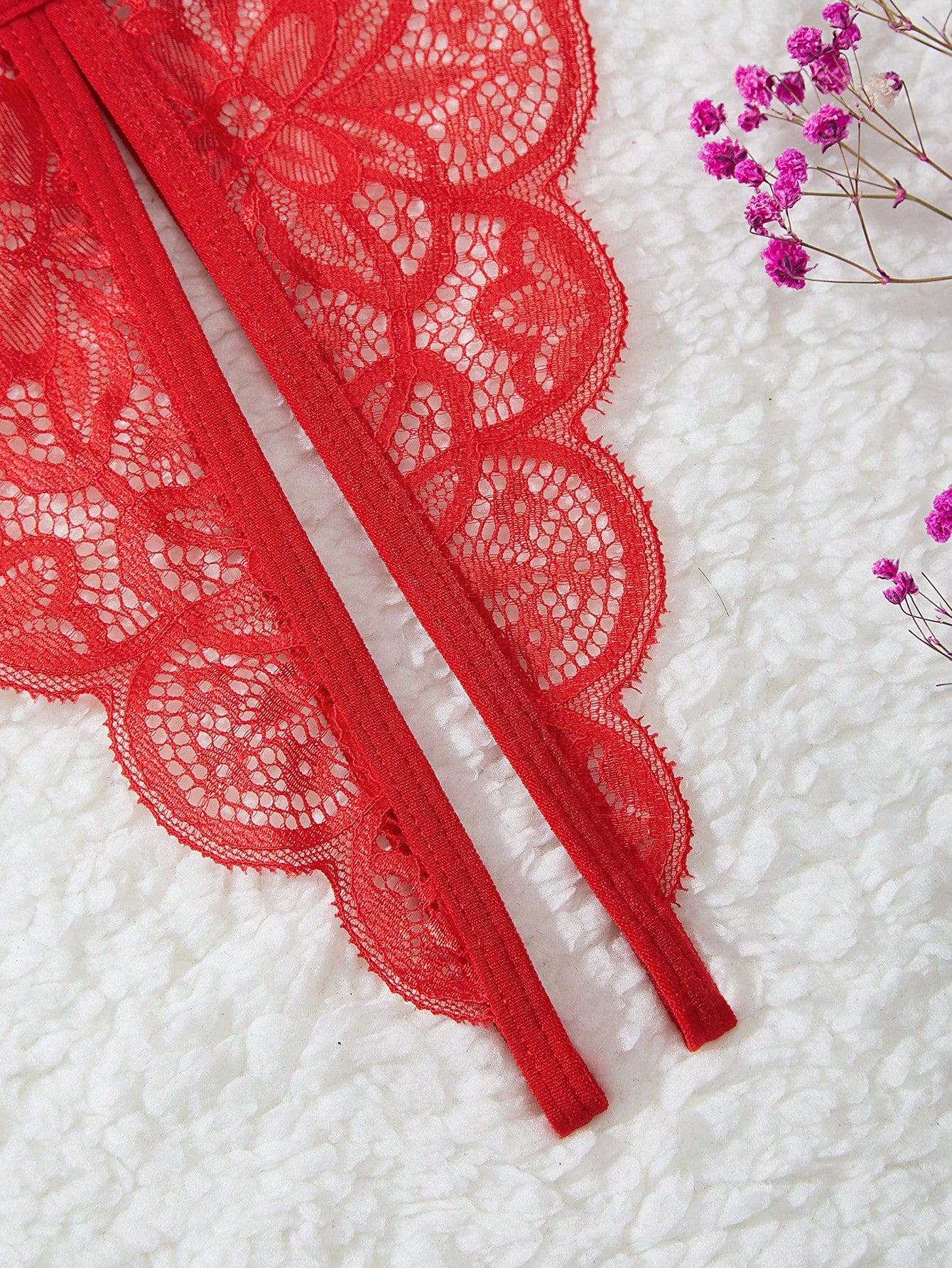 Two-piece women’s sexy lingerie set with a wireless bralette and T-back V-string panties, featuring bowknot decoration, hollow-out detailing, and contrast lace accents with adjustable spaghetti straps.