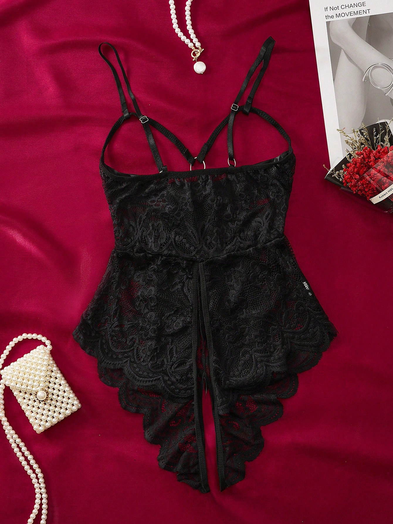 1-piece women’s sexy lingerie bodysuit with contrast lace, see-through design, cut-out details, spaghetti straps, and open crotch style.