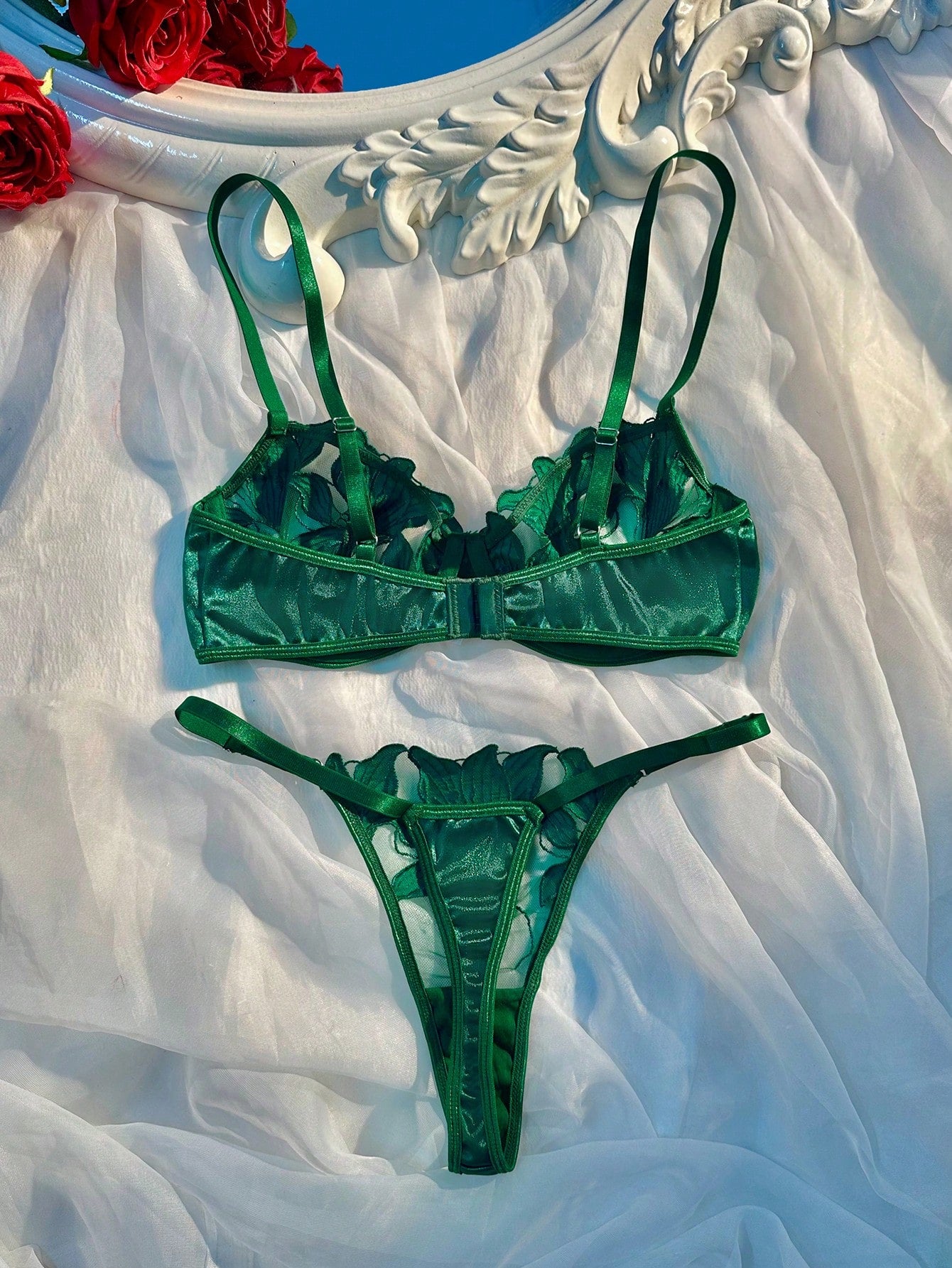 Women’s 2-piece sexy lingerie set featuring an embroidered sheer mesh demi bra with adjustable spaghetti straps and a matching low-rise thong.