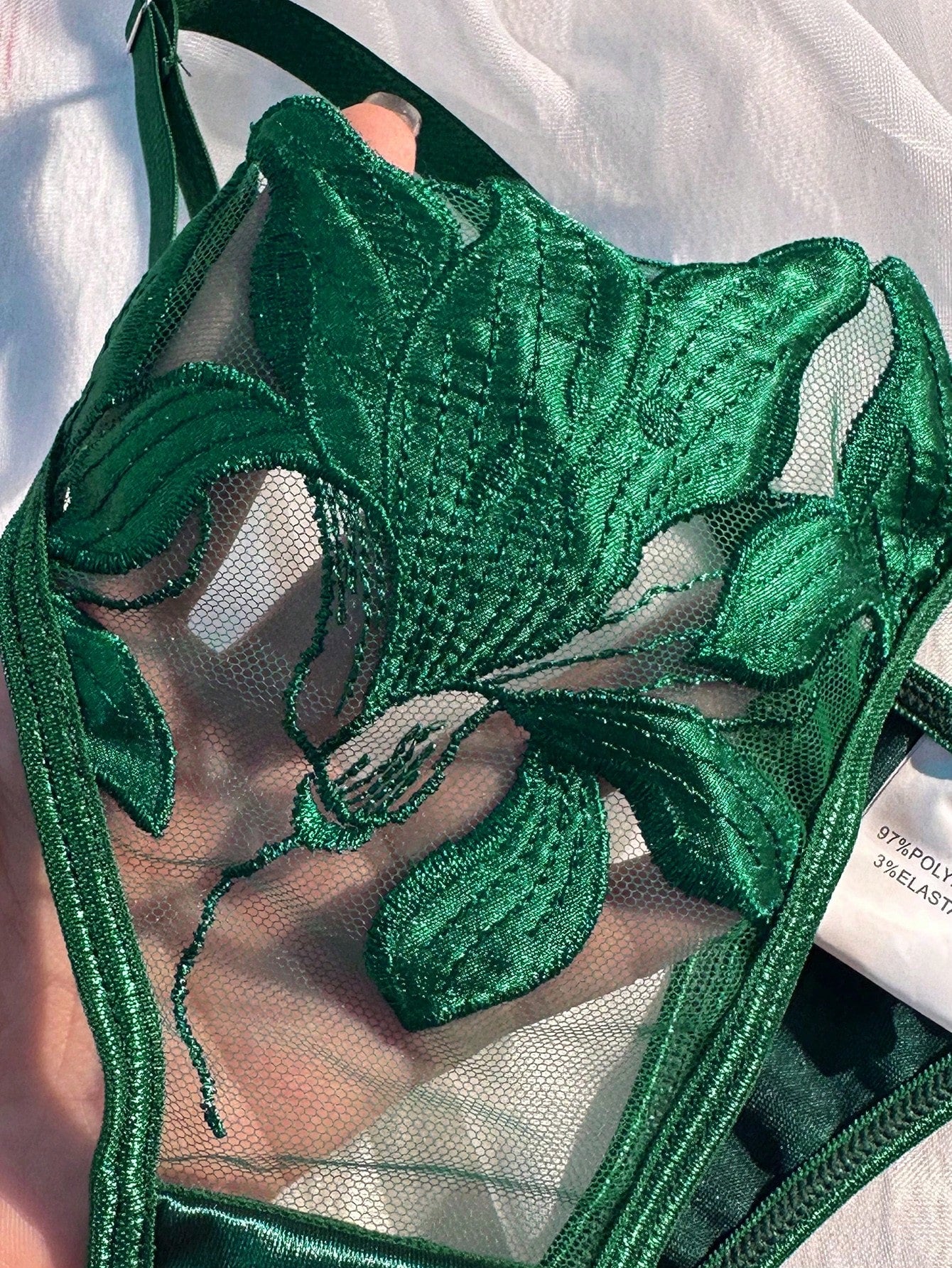 Women’s 2-piece sexy lingerie set featuring an embroidered sheer mesh demi bra with adjustable spaghetti straps and a matching low-rise thong.