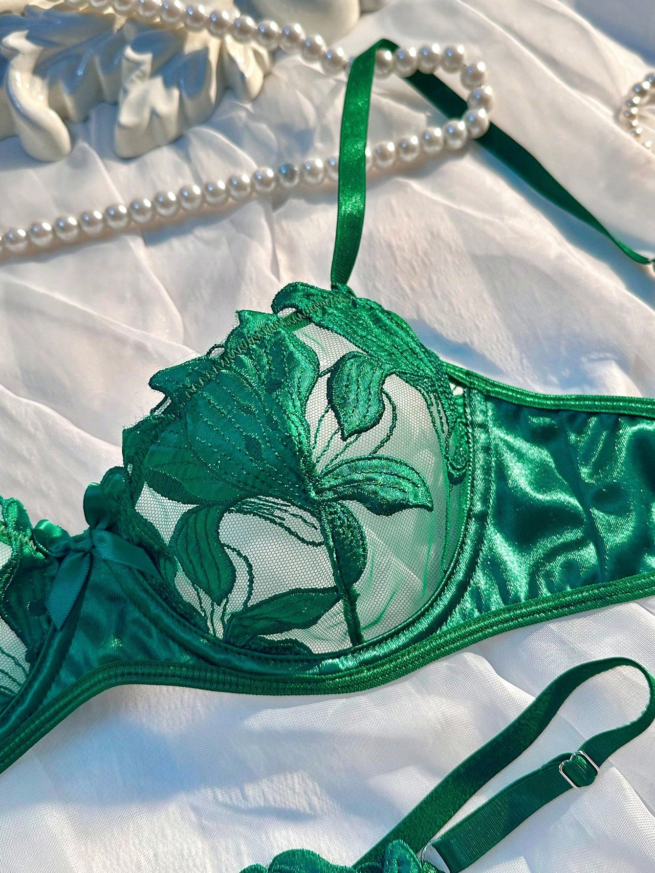 Women’s 2-piece sexy lingerie set featuring an embroidered sheer mesh demi bra with adjustable spaghetti straps and a matching low-rise thong.