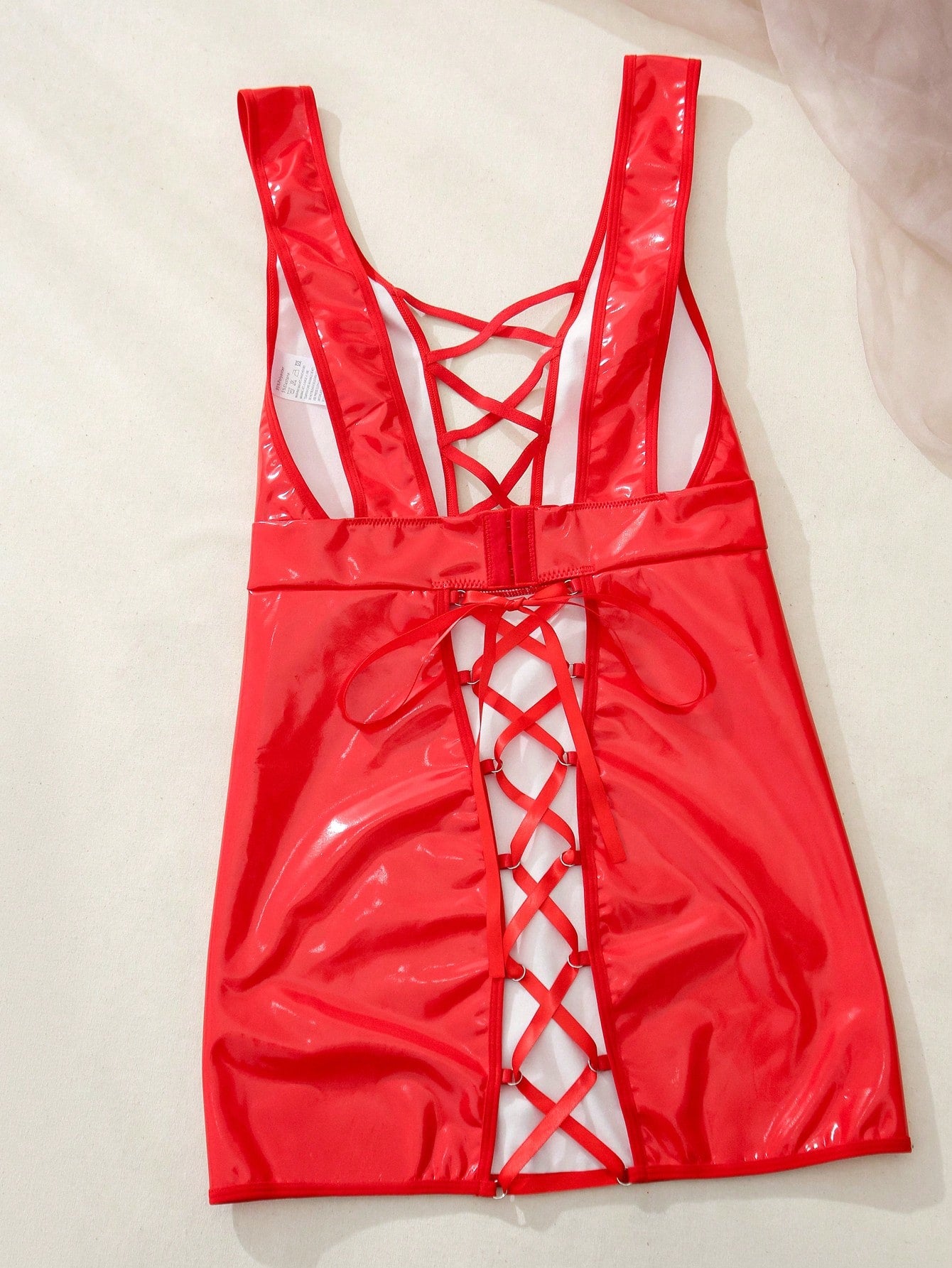 Women’s 2-piece lingerie set featuring a backless criss-cross bodycon mini dress with cut-out details, deep V neckline, adjustable straps, and matching low-rise thong.