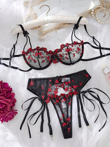 3-piece women’s lingerie set featuring a bandeau top and G-string thong, with embroidery, sheer details, knot accents, underwire demi bra styling, and adjustable spaghetti straps.