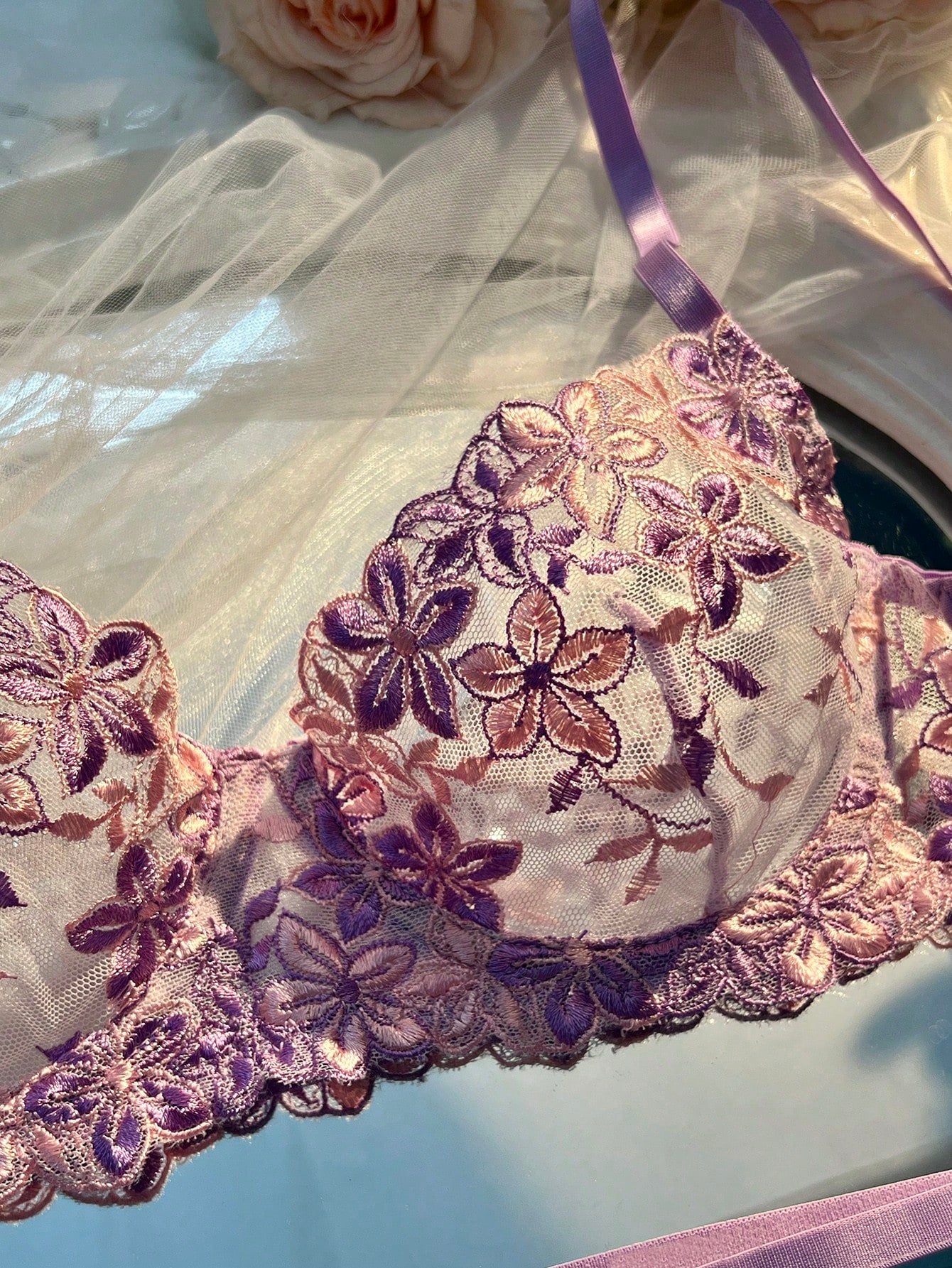 Three-piece women’s sexy lingerie set featuring floral embroidery and sheer details, with a spaghetti strap underwire bralette and matching low-rise briefs.