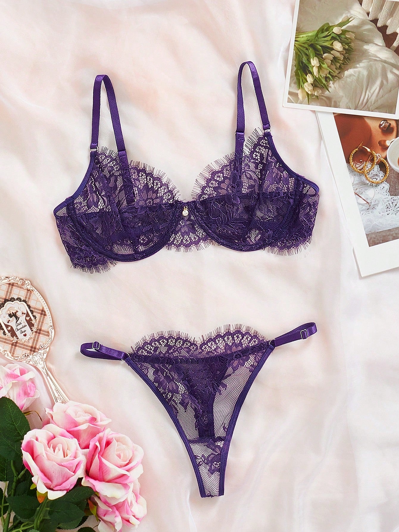 Two-piece floral lace lingerie set featuring an underwire plunge bra with adjustable spaghetti straps and a matching mid-rise thong, shown in plain sheer lace. Available in Black, Burgundy, and Purple.
