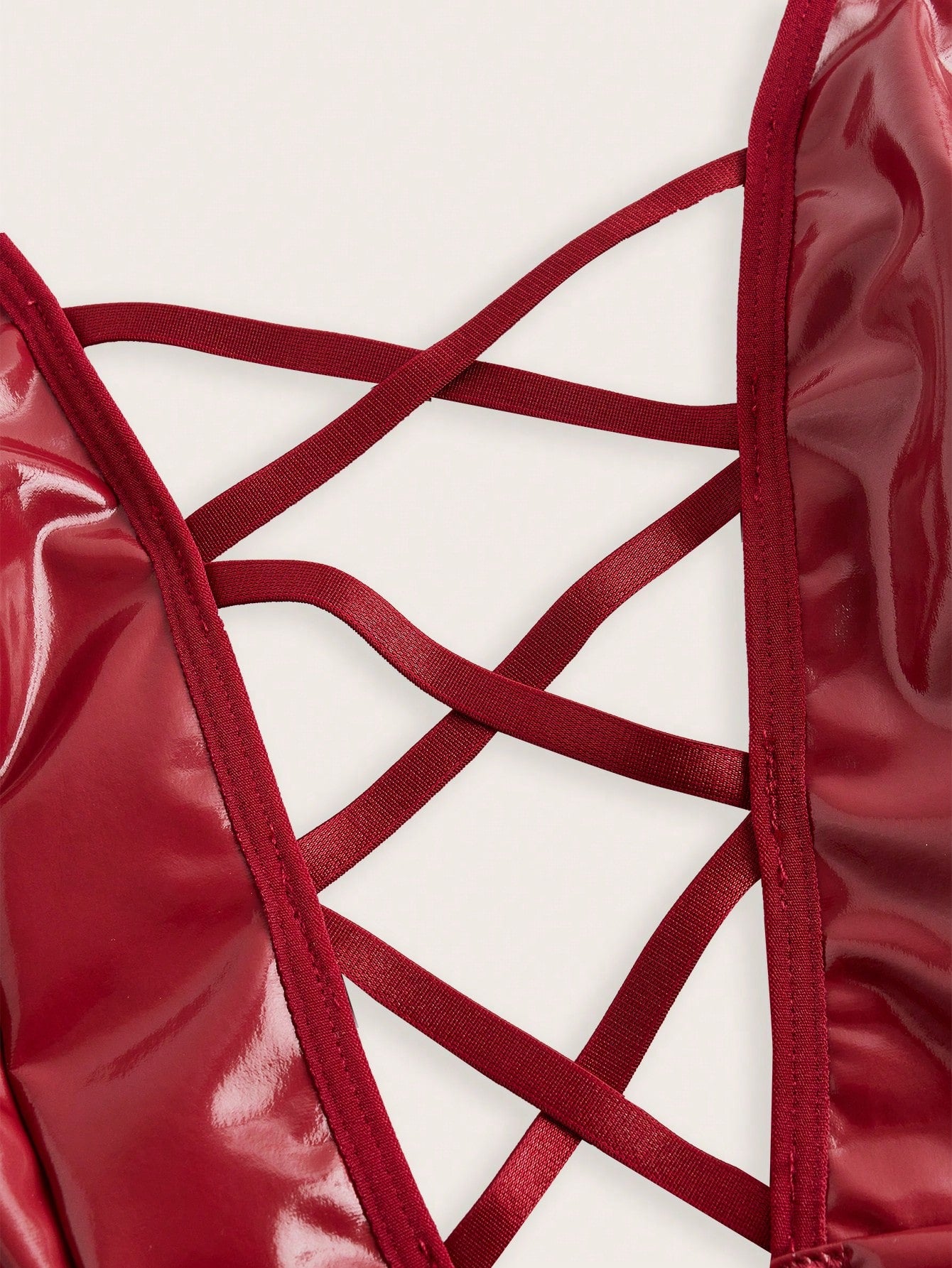 Women’s 2-piece lingerie set featuring a backless criss-cross bodycon mini dress with cut-out details, deep V neckline, adjustable straps, and matching low-rise thong.
