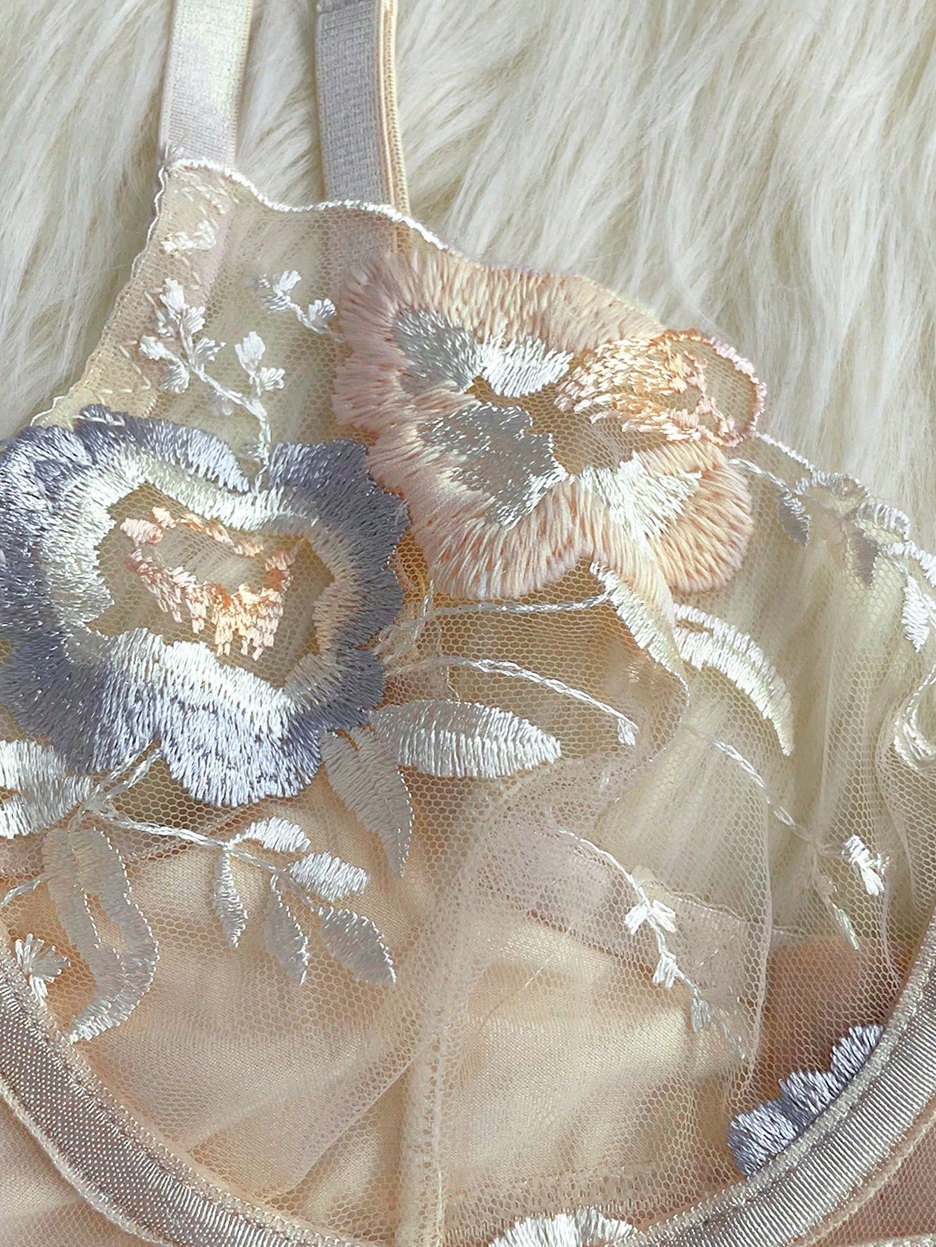 Apricot embroidered sexy lingerie set with an underwire triangle cup bra, matching thong, waistband, and legband in a sheer fantasy-gorgeous style.