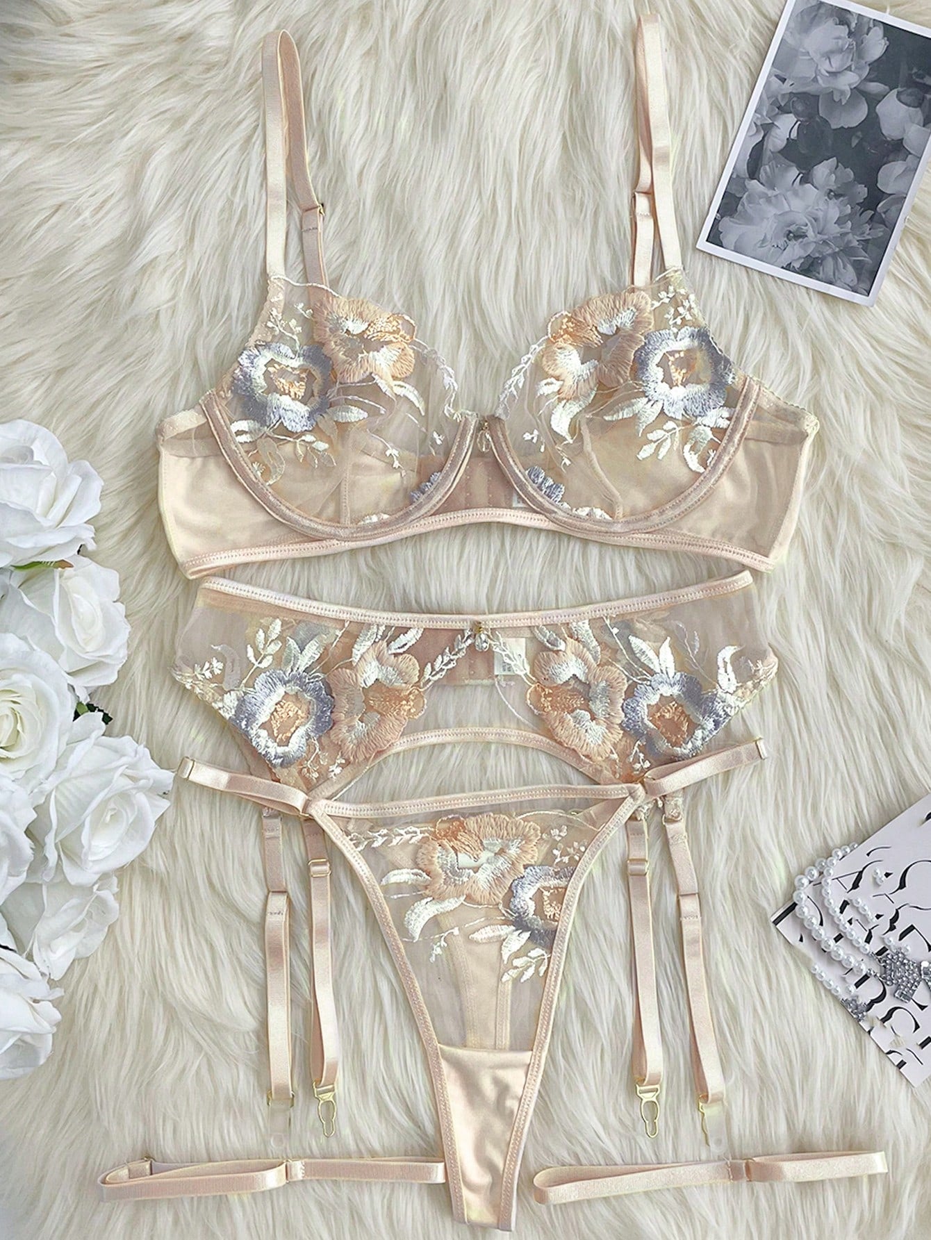 Apricot embroidered sexy lingerie set with an underwire triangle cup bra, matching thong, waistband, and legband in a sheer fantasy-gorgeous style.