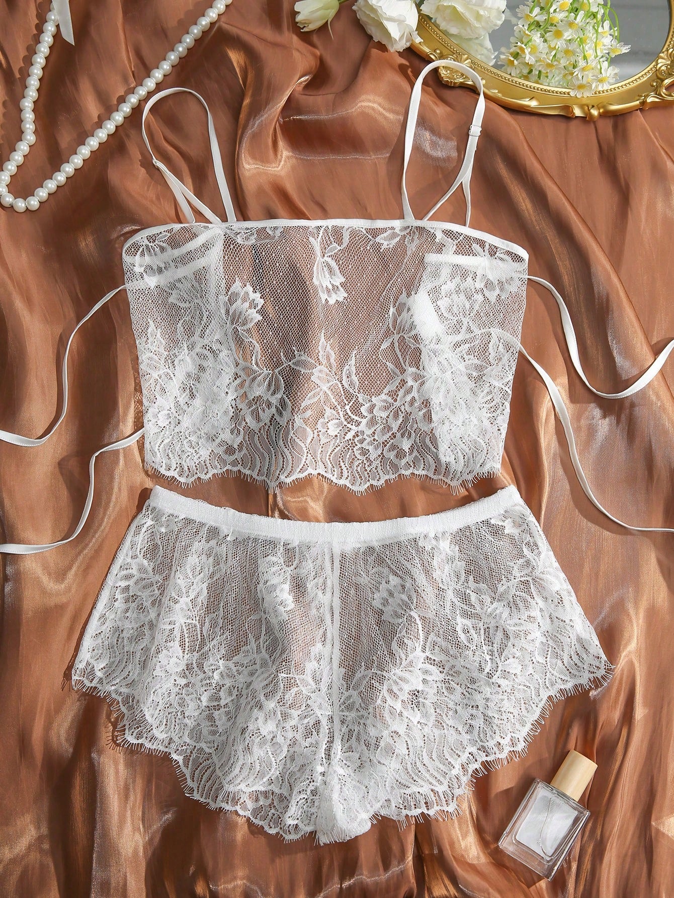 White floral lace lingerie set featuring a sheer contrast lace bralette with spaghetti straps and matching mid-rise boyshorts, 2-piece sexy set.