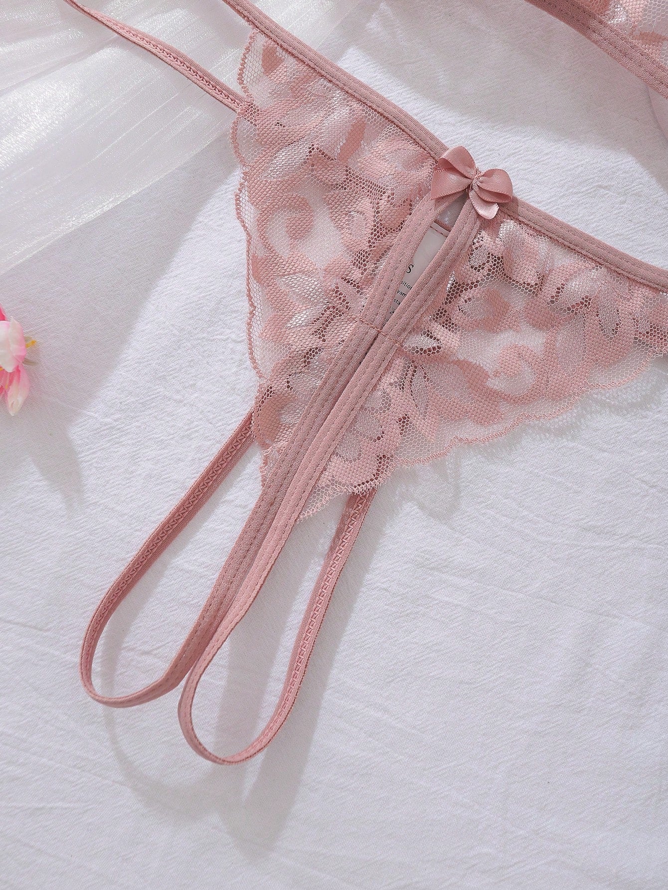 Coffee brown women's 2-piece lingerie set featuring a halter bralette with bowknot detail, contrast lace, triangle cups, cut-out accents, and tie-back design, paired with a matching low-rise thong.