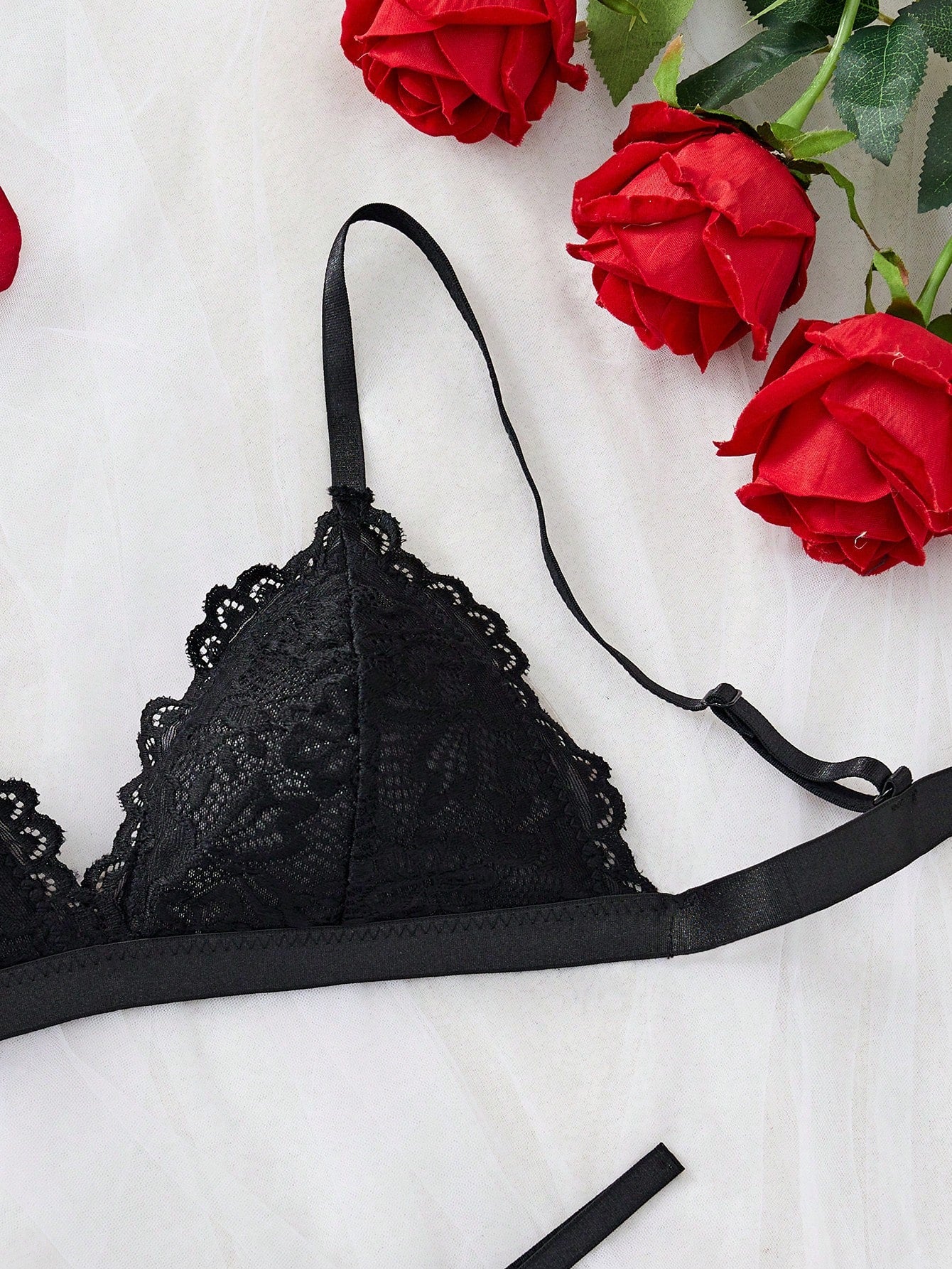 Women's 2-piece lingerie set with a solid color lace patchwork cami bralette featuring spaghetti straps and a crossback design, paired with a matching low-rise thong panty.