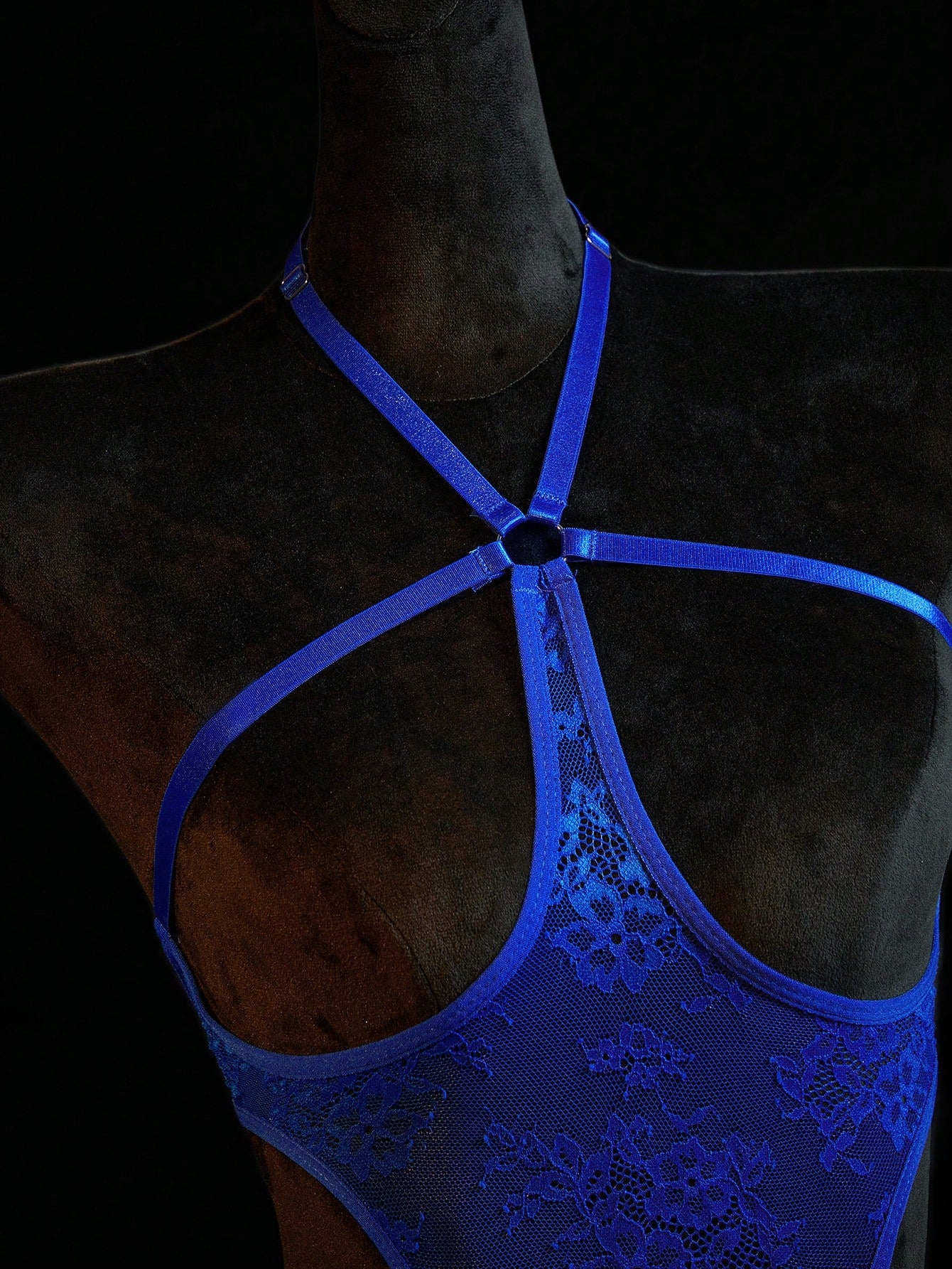 Neon green women’s lace bodysuit lingerie with hollow-out cut-out design, halter neckline, and adjustable straps, shown as a sexy going-out style.