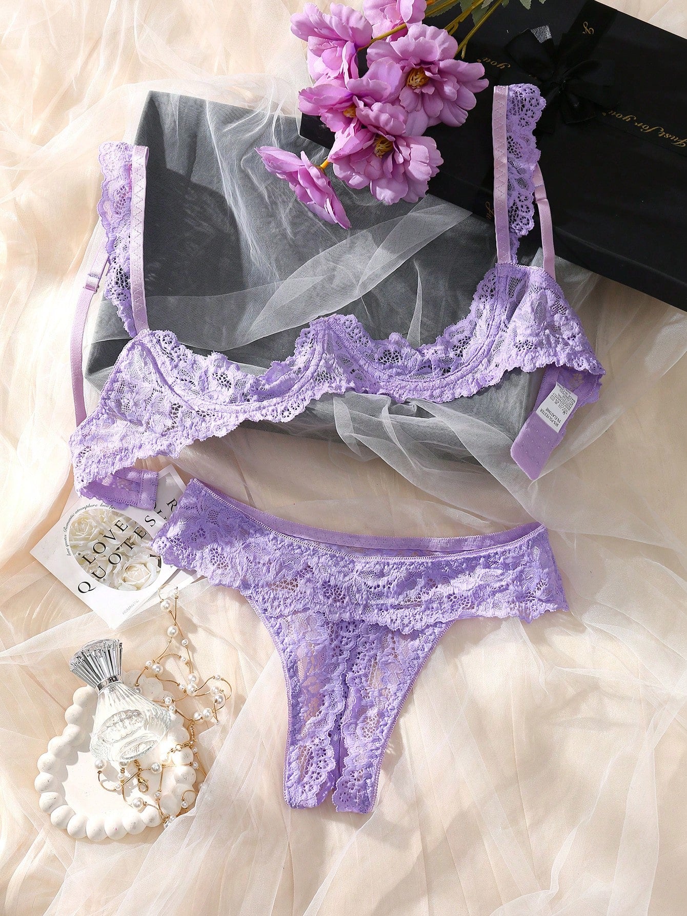 Women’s 2-piece contrast lace lingerie set with a sheer plain design, featuring an underwire open-cup bra with adjustable spaghetti straps and matching low-rise V-string panties.