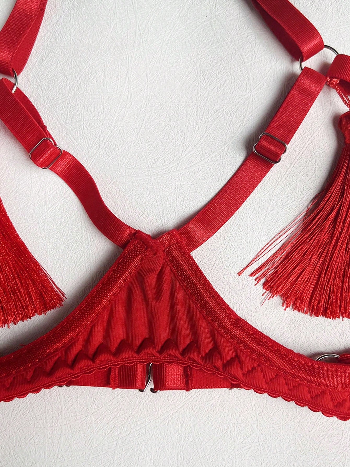 Red fringe satin exposed-bust lingerie set with open collar, spaghetti straps, underwire longline triangle-cup bra, and matching low-rise thong; 3-piece set, gloves not included.