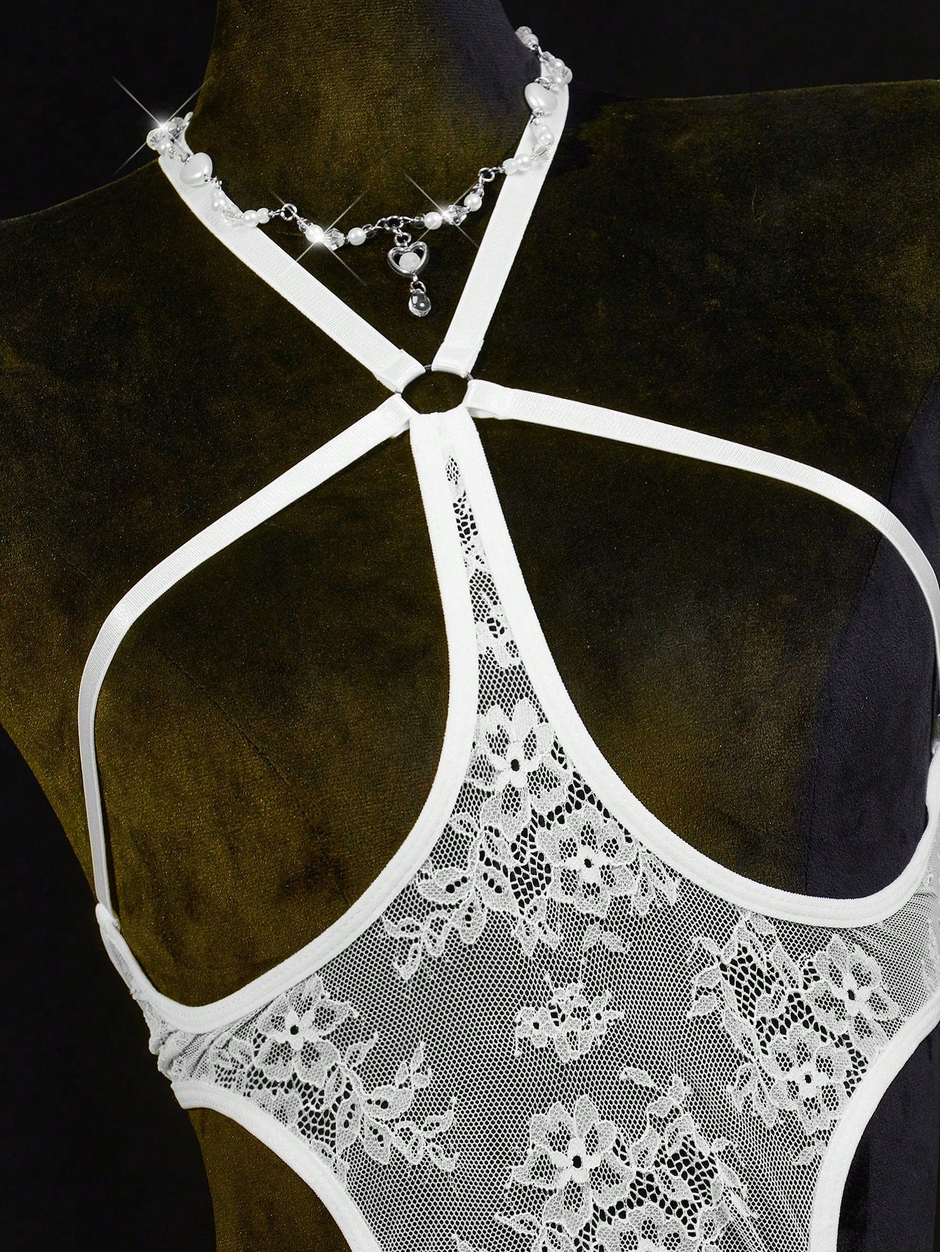 Neon green women’s lace bodysuit lingerie with hollow-out cut-out design, halter neckline, and adjustable straps, shown as a sexy going-out style.