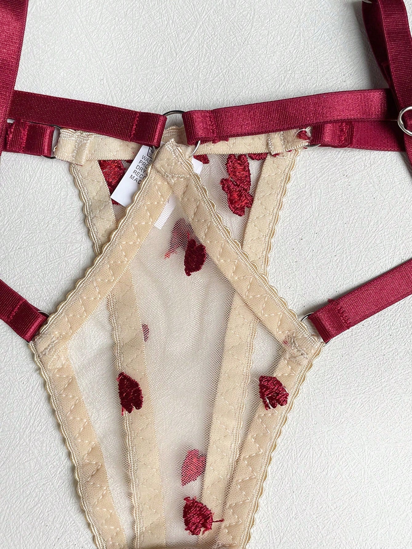 Red romantic embroidered lingerie set featuring a sheer underwire triangle bra with adjustable spaghetti straps, matching embroidered thong, waistband, leg straps, and a complimentary collar; 5-piece sexy Valentine-style set.