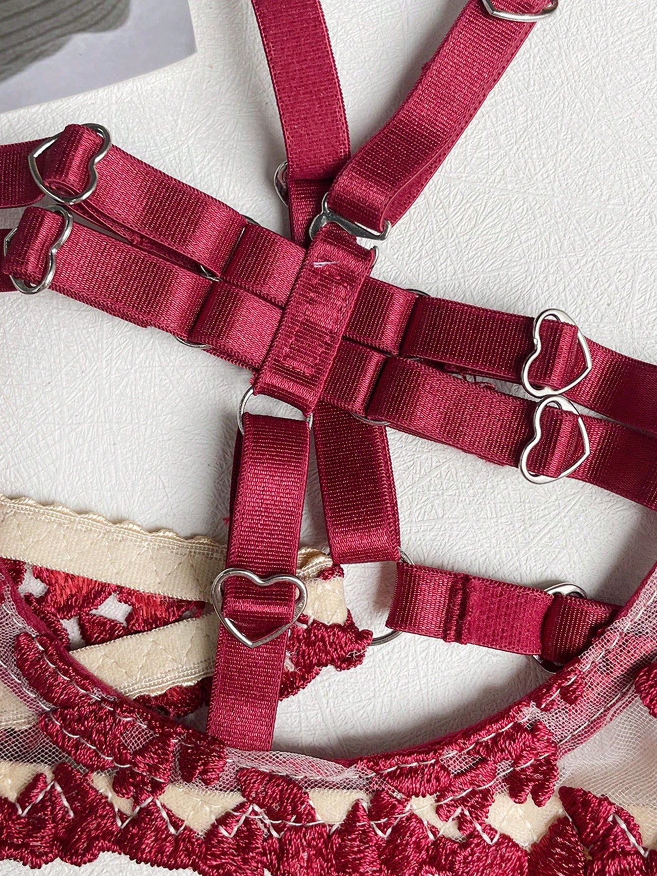 Red romantic embroidered lingerie set featuring a sheer underwire triangle bra with adjustable spaghetti straps, matching embroidered thong, waistband, leg straps, and a complimentary collar; 5-piece sexy Valentine-style set.