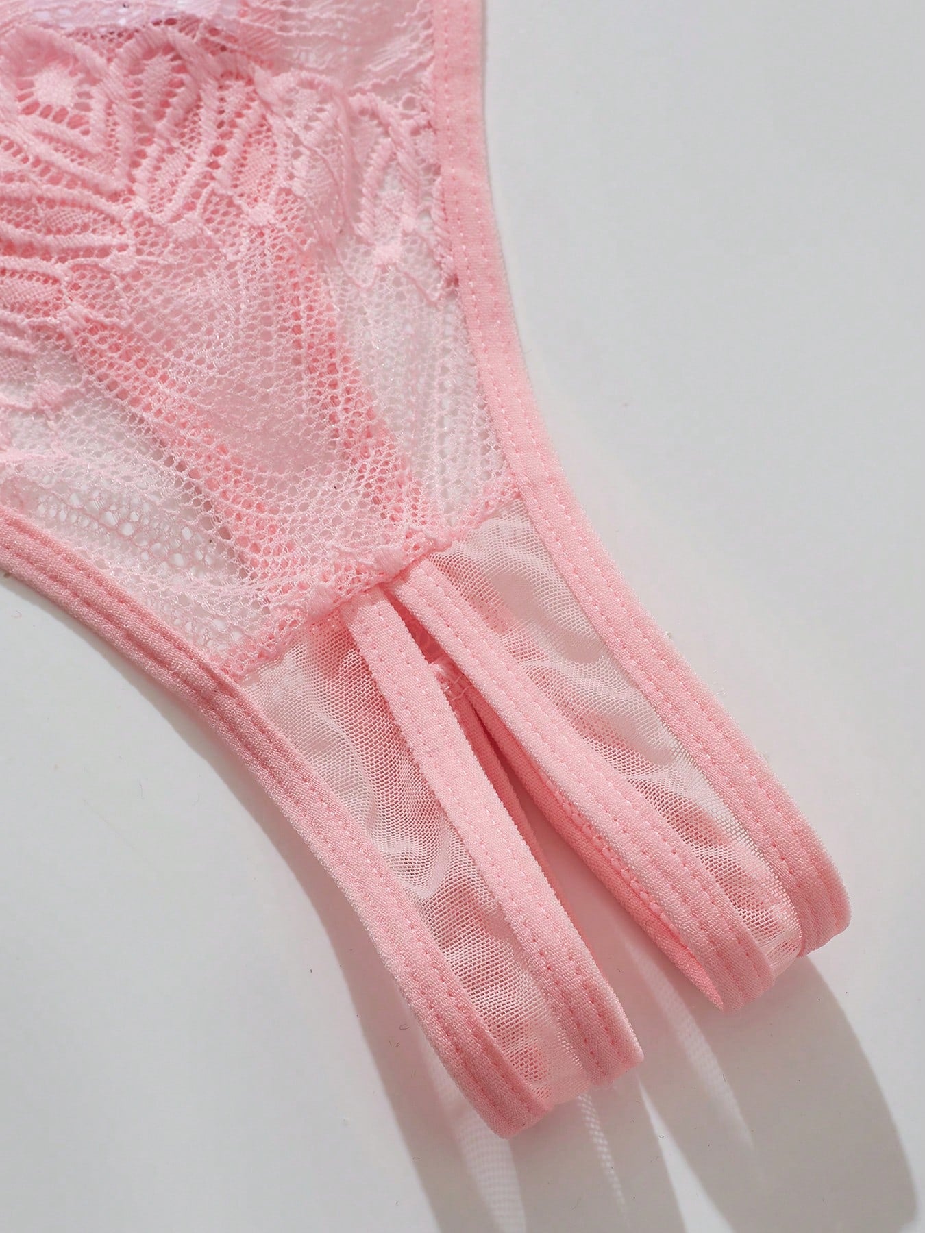 Women’s sexy floral lace lingerie set featuring a bra and thong panty in a 2-piece matching set.