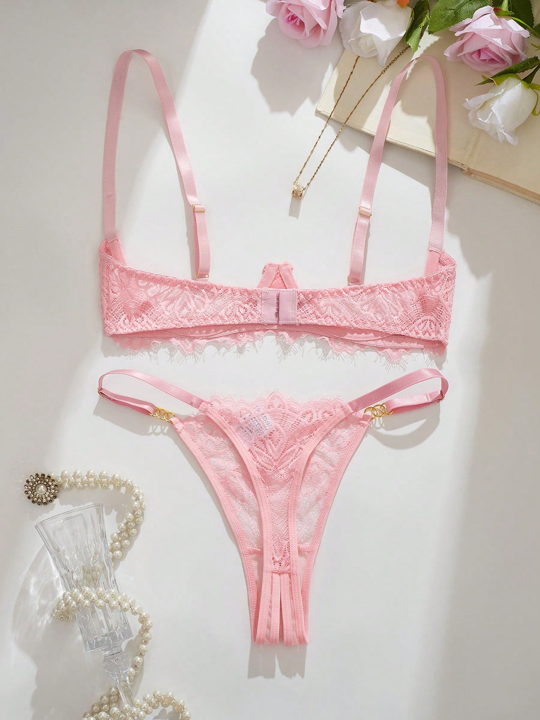 Women’s sexy floral lace lingerie set featuring a bra and thong panty in a 2-piece matching set.