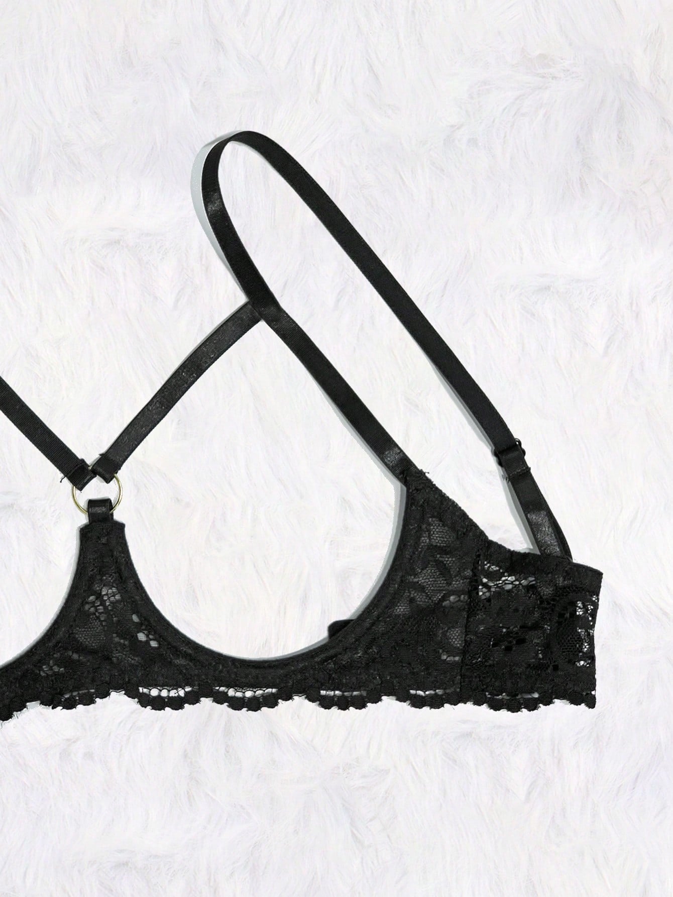 Women's black 2-piece lace lingerie set featuring a sheer wireless bralette with bowknot detail and adjustable spaghetti straps, paired with low-rise open crotch tanga thong panties.