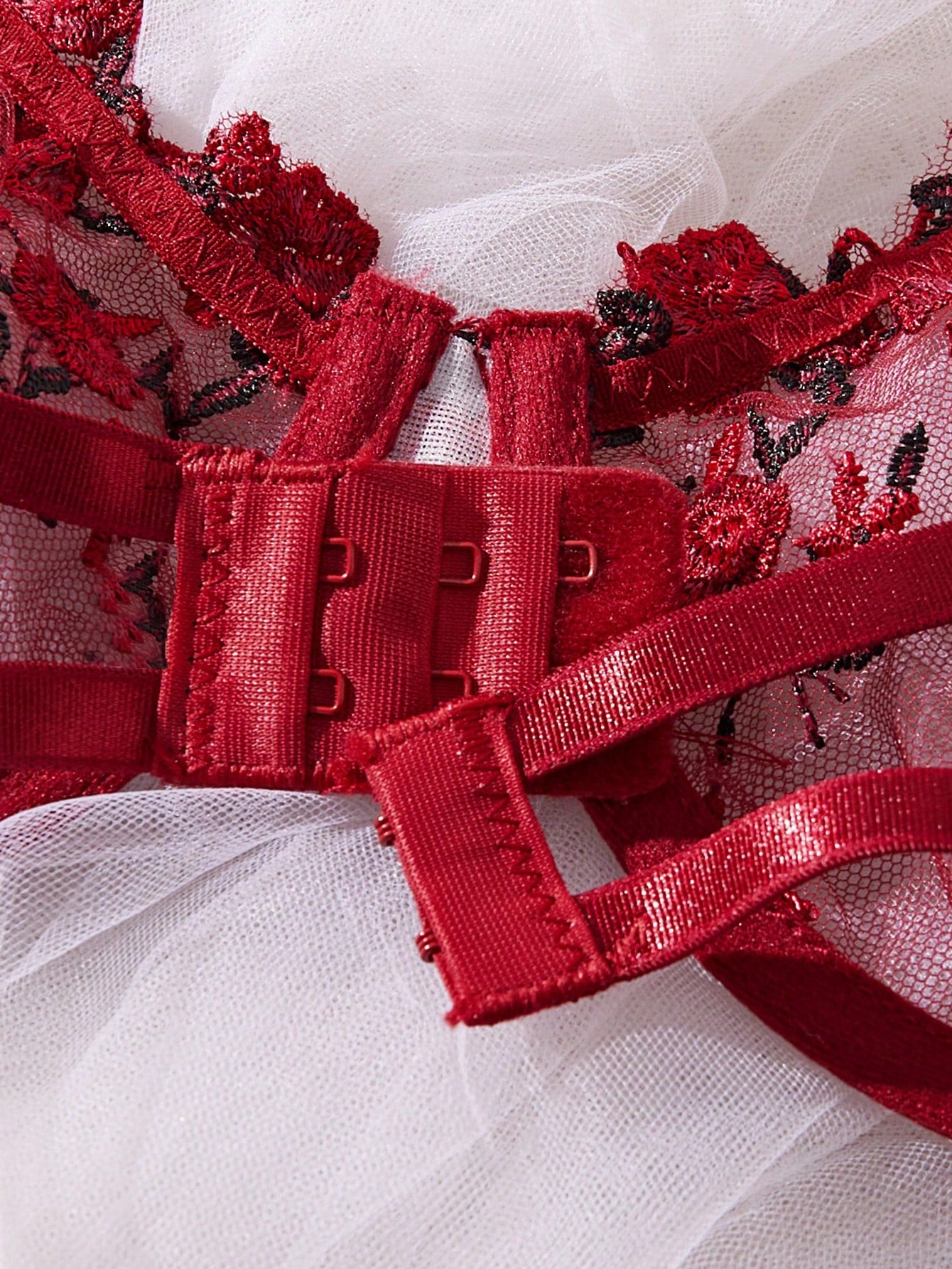 3-piece women’s lingerie set featuring a bandeau top and G-string thong, with embroidery, sheer details, knot accents, underwire demi bra styling, and adjustable spaghetti straps.