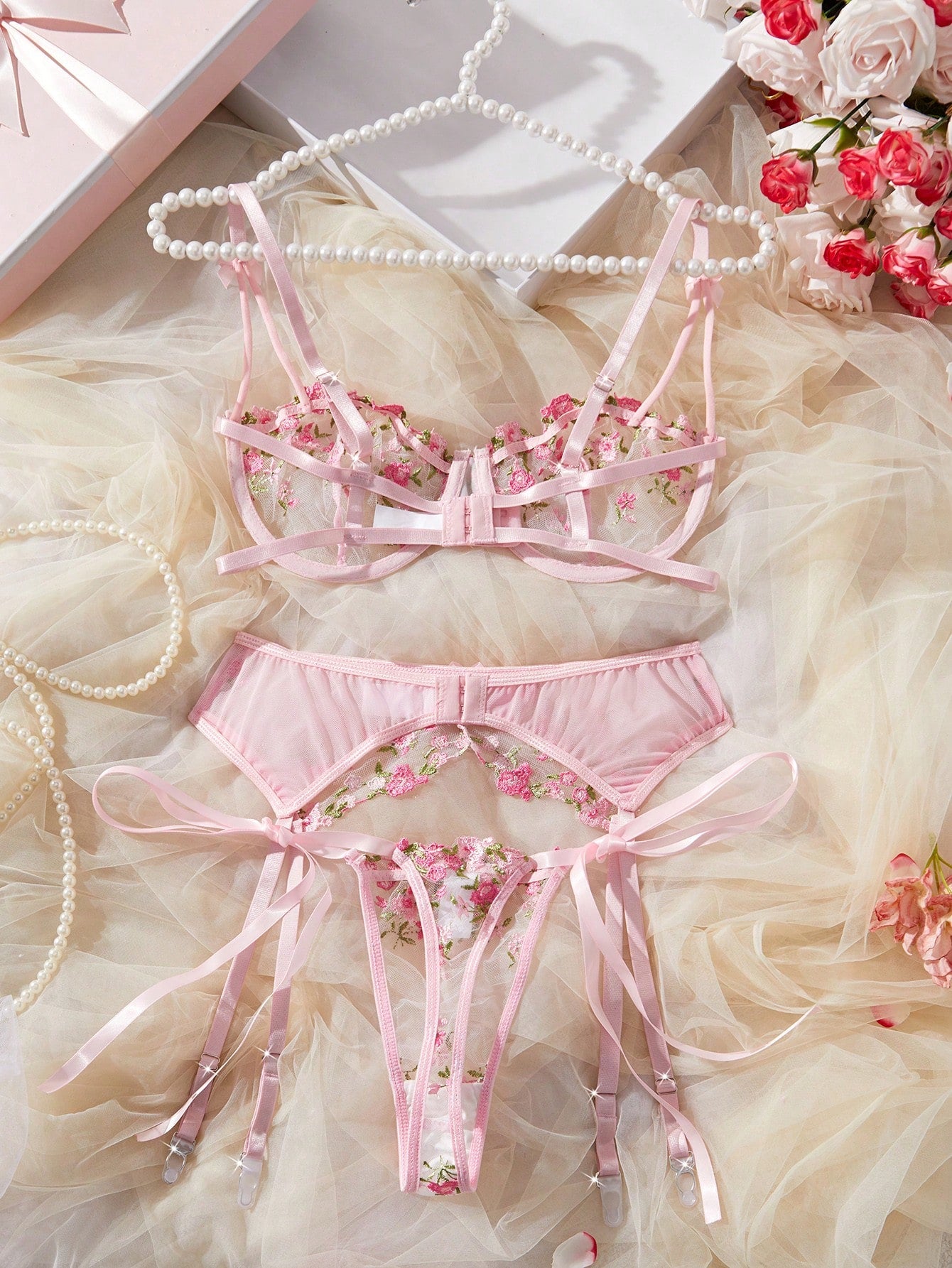 3-piece women’s lingerie set featuring a bandeau top and G-string thong, with embroidery, sheer details, knot accents, underwire demi bra styling, and adjustable spaghetti straps.