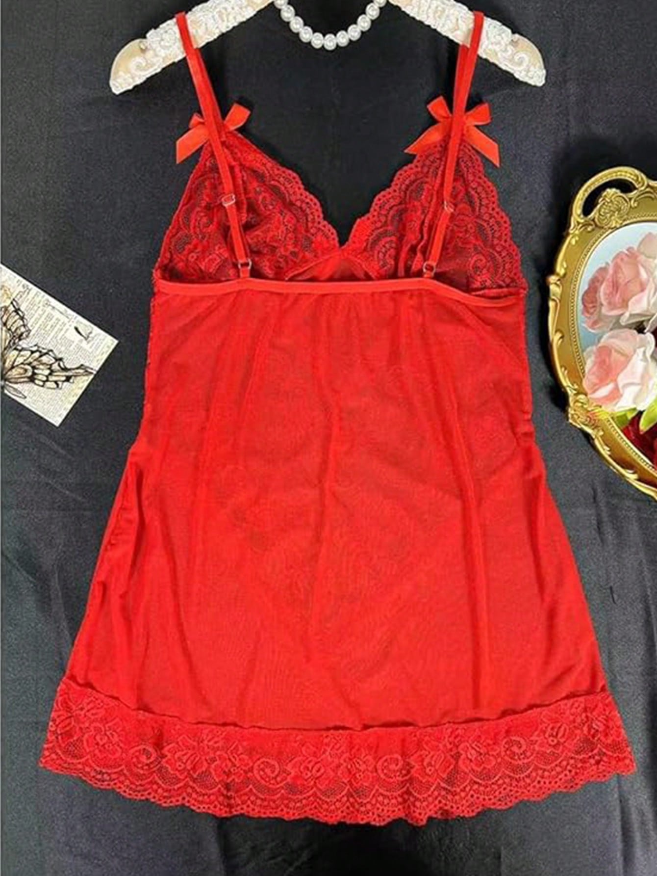 2-piece women’s lingerie set featuring a lace camisole-style mini nightdress with spaghetti straps and a matching thong, designed for loungewear, romantic occasions, and rave styling.