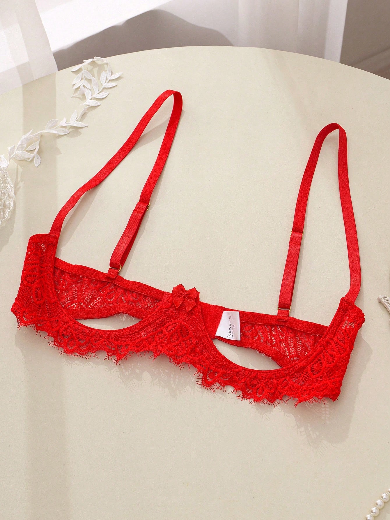 Women’s sexy floral lace lingerie set featuring a bra and thong panty in a 2-piece matching set.