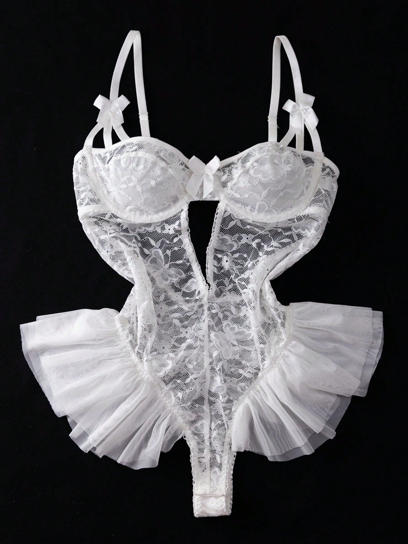 Women’s butterfly lace and mesh lingerie jumpsuit with ruffled trim, underwire cups, bow detail, cut-out accents, sheer fabric, and adjustable spaghetti straps.