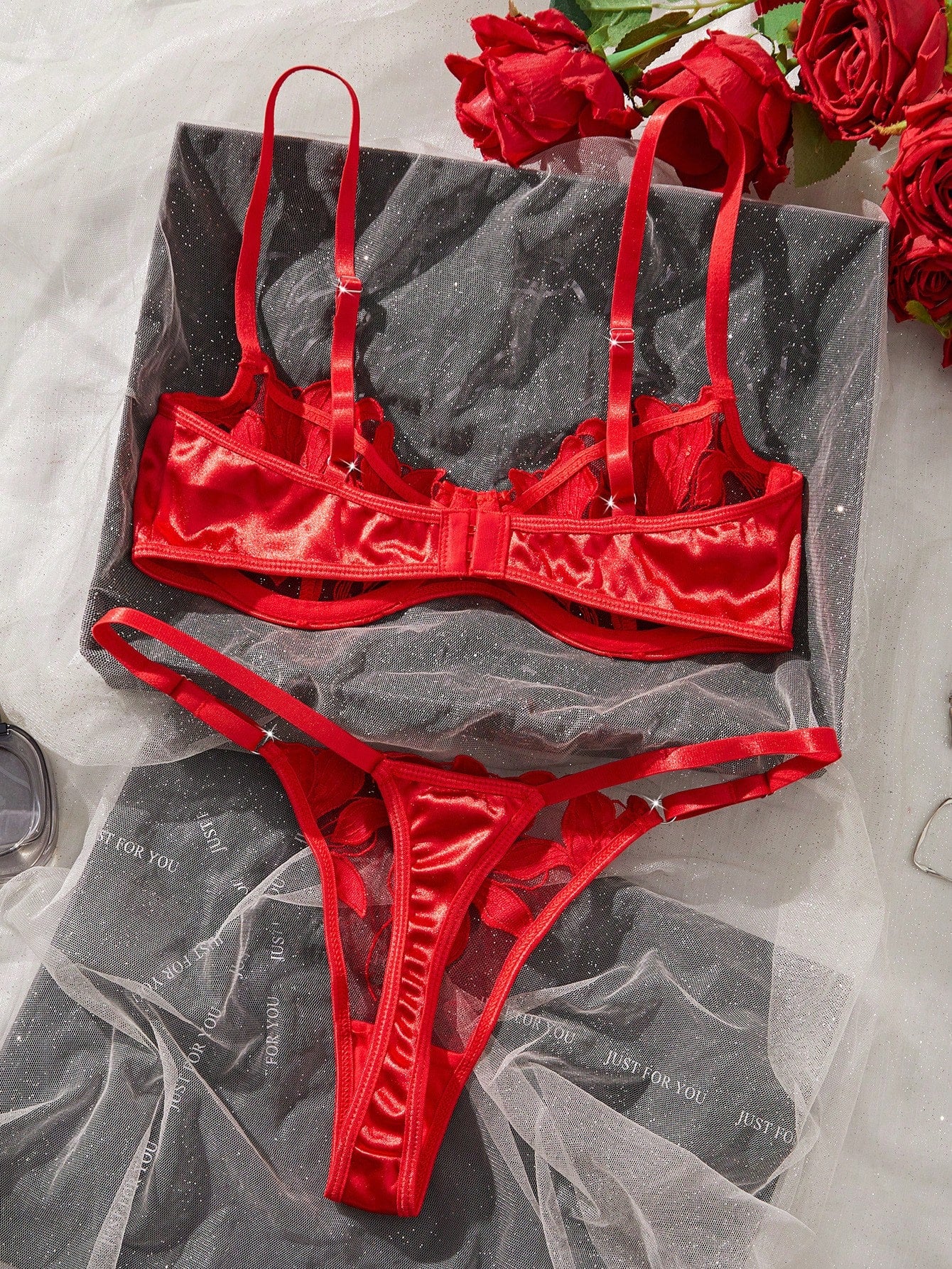 Women’s 2-piece sexy lingerie set featuring an embroidered sheer mesh demi bra with adjustable spaghetti straps and a matching low-rise thong.