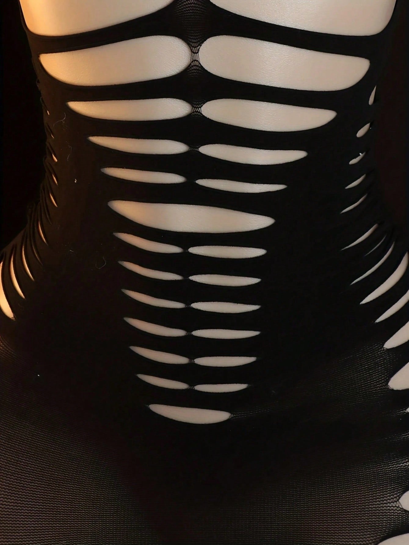 Black women’s one-piece mesh bodysuit with a strapless design, stand collar, long sleeves, and backless cut-out detailing. Short length with high-stretch knitted fabric, suitable for party and festival wear.
