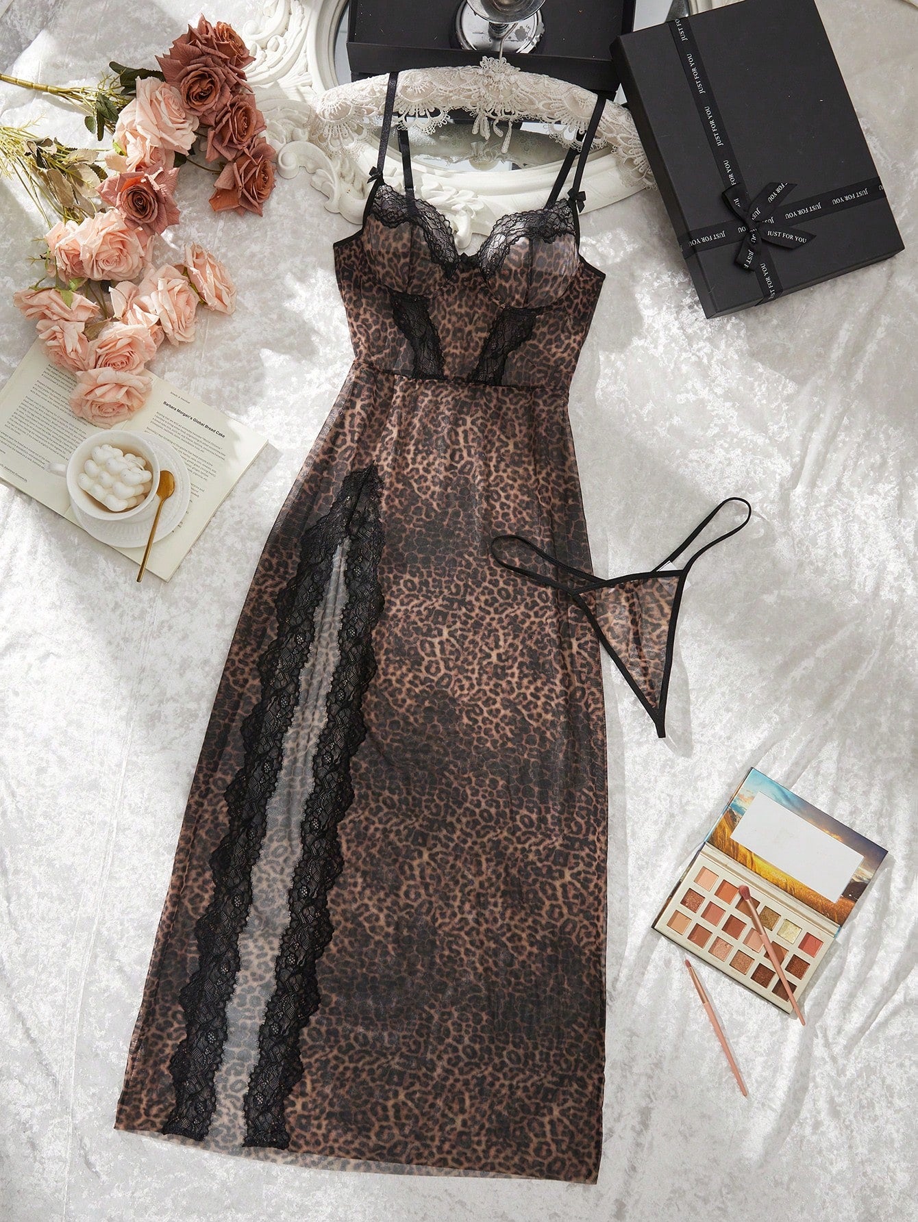 Two-piece women’s leopard print lace patchwork lingerie set featuring a spaghetti strap high slit maxi dress and matching V-string panty.