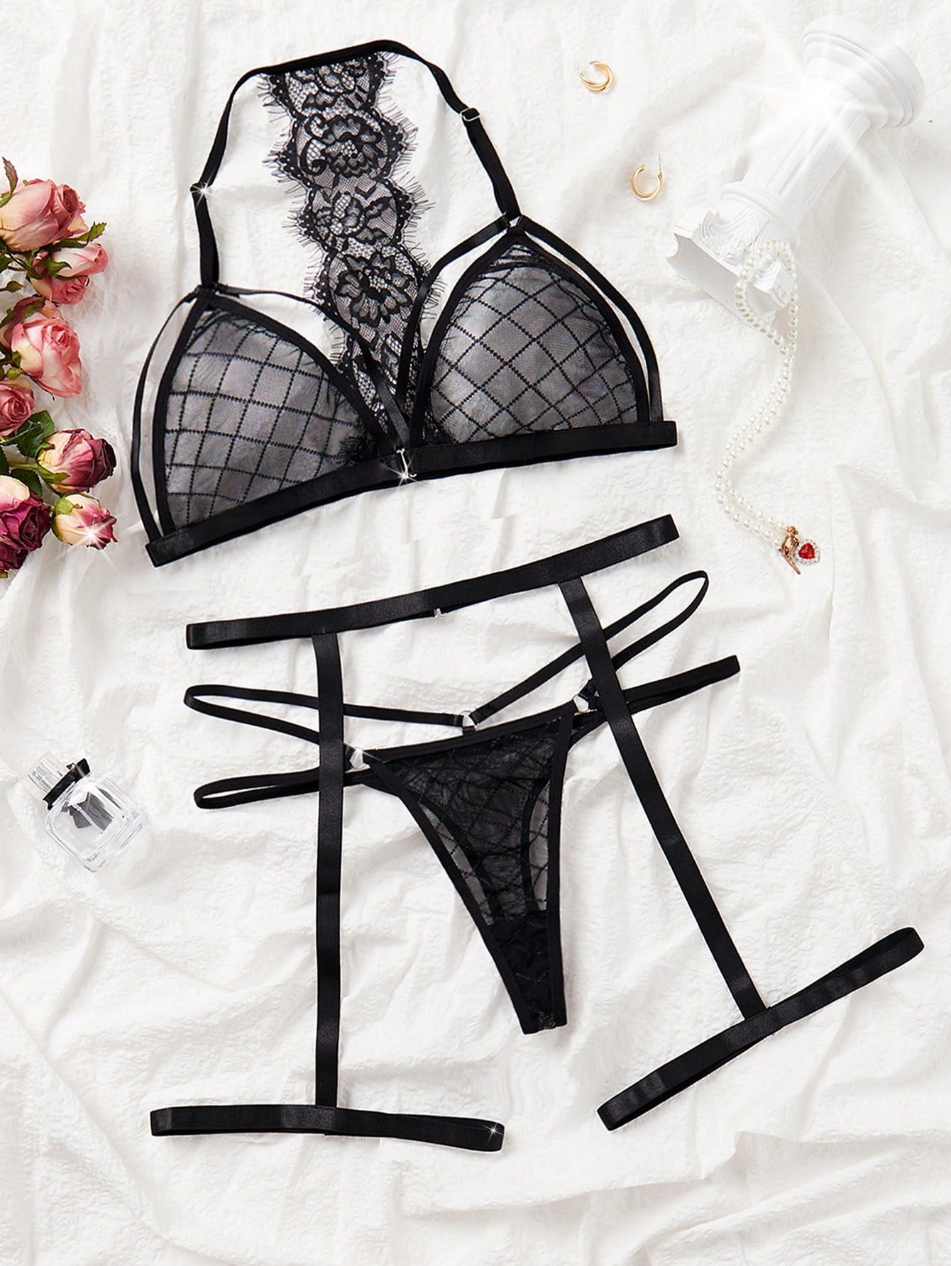 Black 3-piece lingerie set featuring eyelash lace panel details, plaid mesh, adjustable spaghetti straps, bralette top, thong panties, and garter-style design.