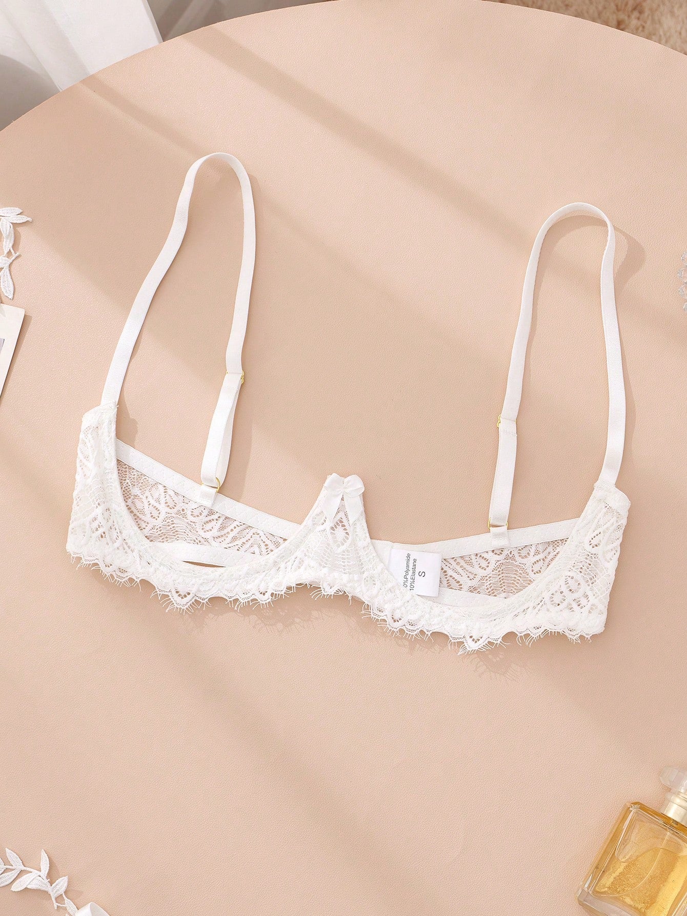 Women’s sexy floral lace lingerie set featuring a bra and thong panty in a 2-piece matching set.
