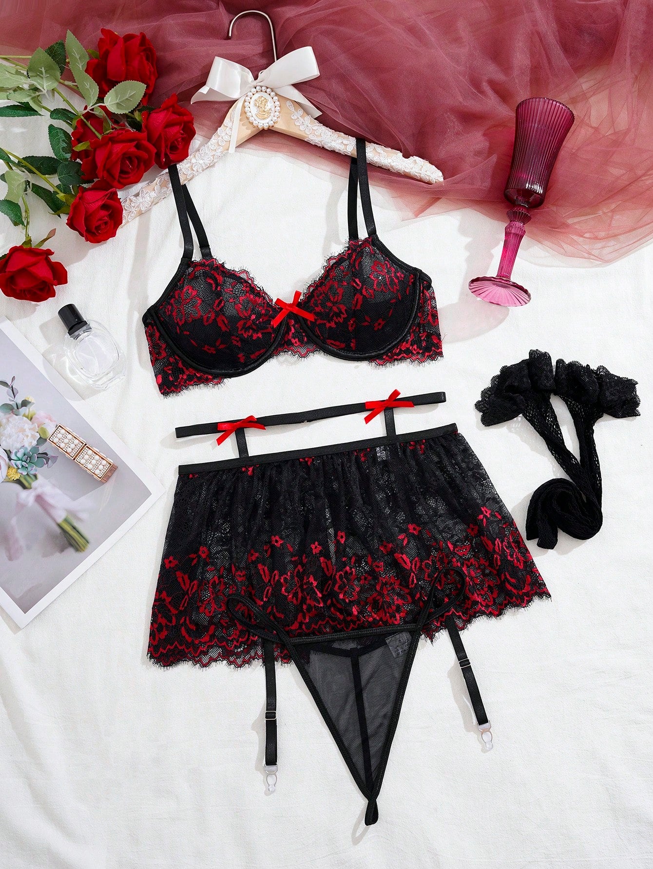 Multicolor 5-piece women's sexy lingerie set featuring a contrast lace underwire bra with adjustable spaghetti straps, matching thong, suspender belt, and two pairs of stockings with bow details.