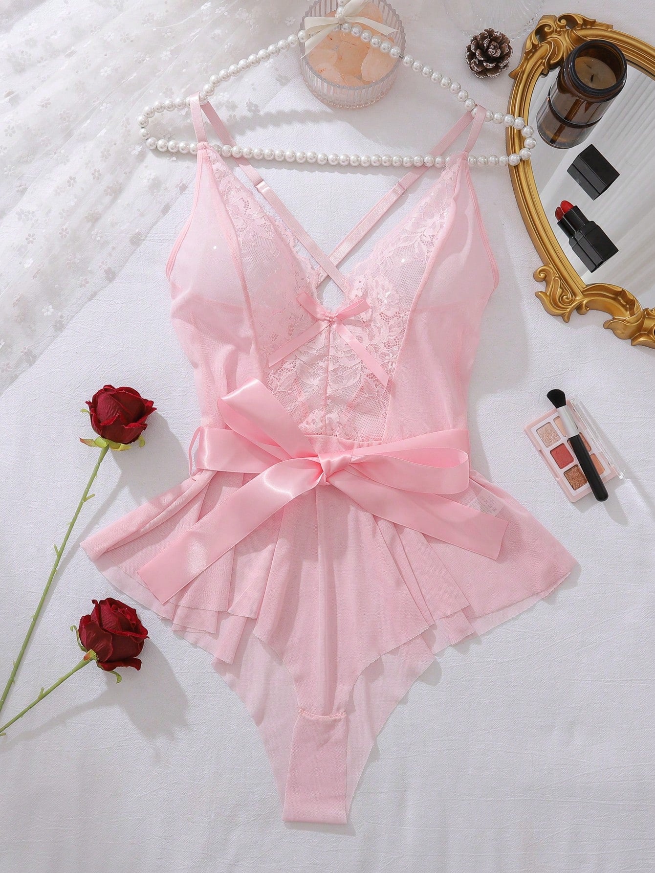 Women’s contrast lace mesh teddy bodysuit lingerie set with bow front detail, ruffle hem, spaghetti straps, and crossback design.