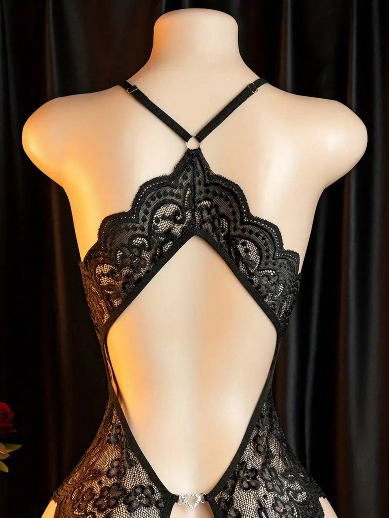 Women's sexy bodysuit with crotchless, hollow-out design, featuring contrast lace and mesh, spaghetti straps, crossback detail, plunge wireless shape, and semi-sheer fabric.