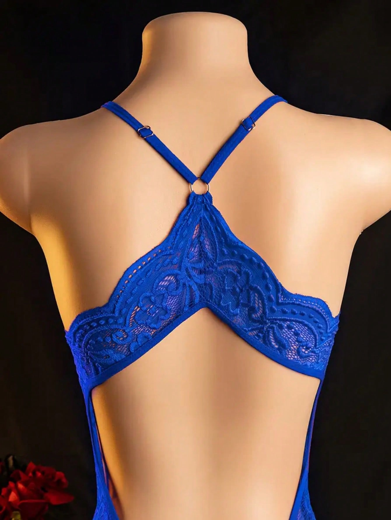 Women's sexy bodysuit with crotchless, hollow-out design, featuring contrast lace and mesh, spaghetti straps, crossback detail, plunge wireless shape, and semi-sheer fabric.