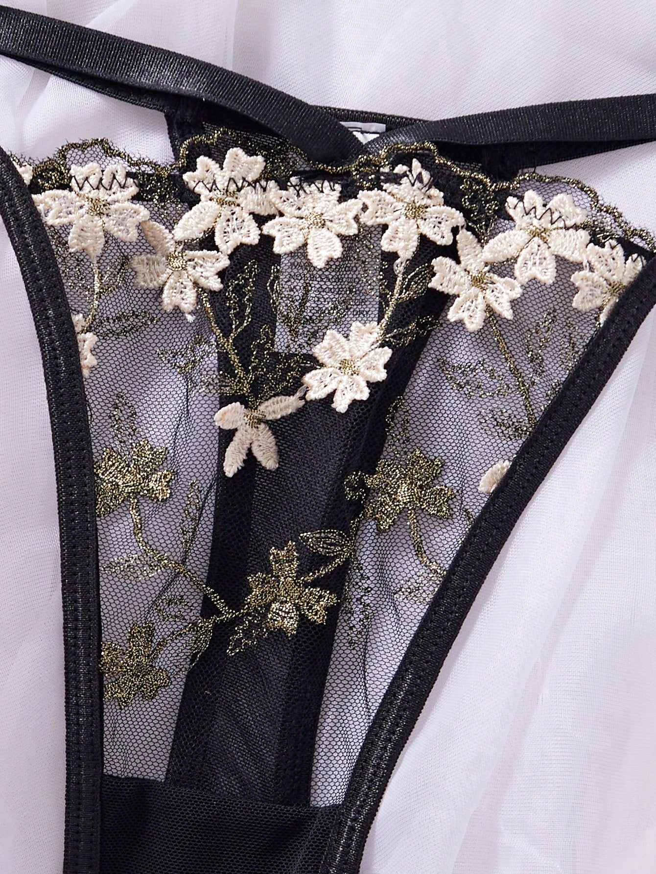 Women's 2-piece sexy lingerie set featuring floral embroidery, underwire demi bra with adjustable spaghetti straps, and matching low-rise thong.