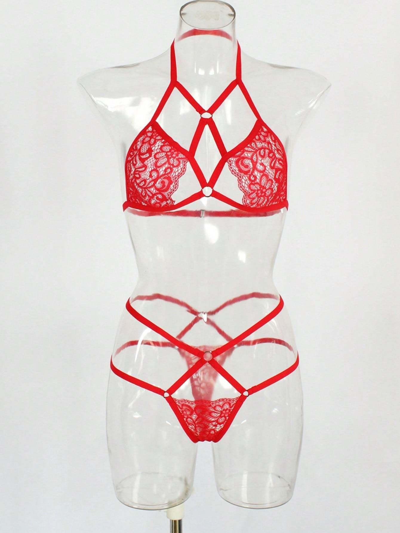 Red lace and mesh women's lingerie set with adjustable strap bralette and low-rise thong, semi-sheer plant pattern design