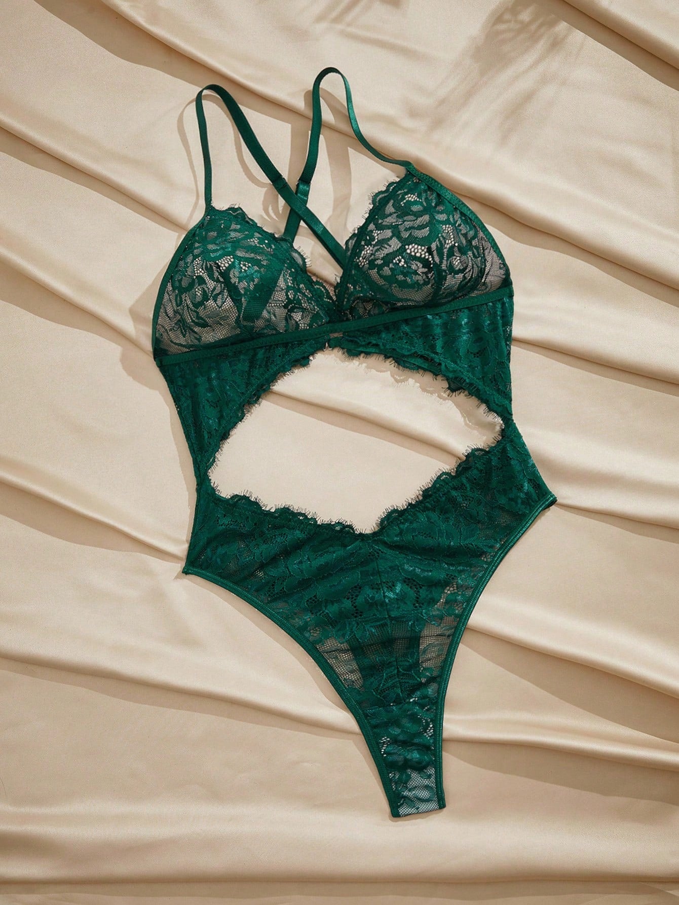 Dark green women’s lace teddy bodysuit set featuring spaghetti straps, backless criss-cross detailing, cut-out accents, and a thong-style high-rise bottom; semi-sheer lace with adjustable straps and wireless bralette support.