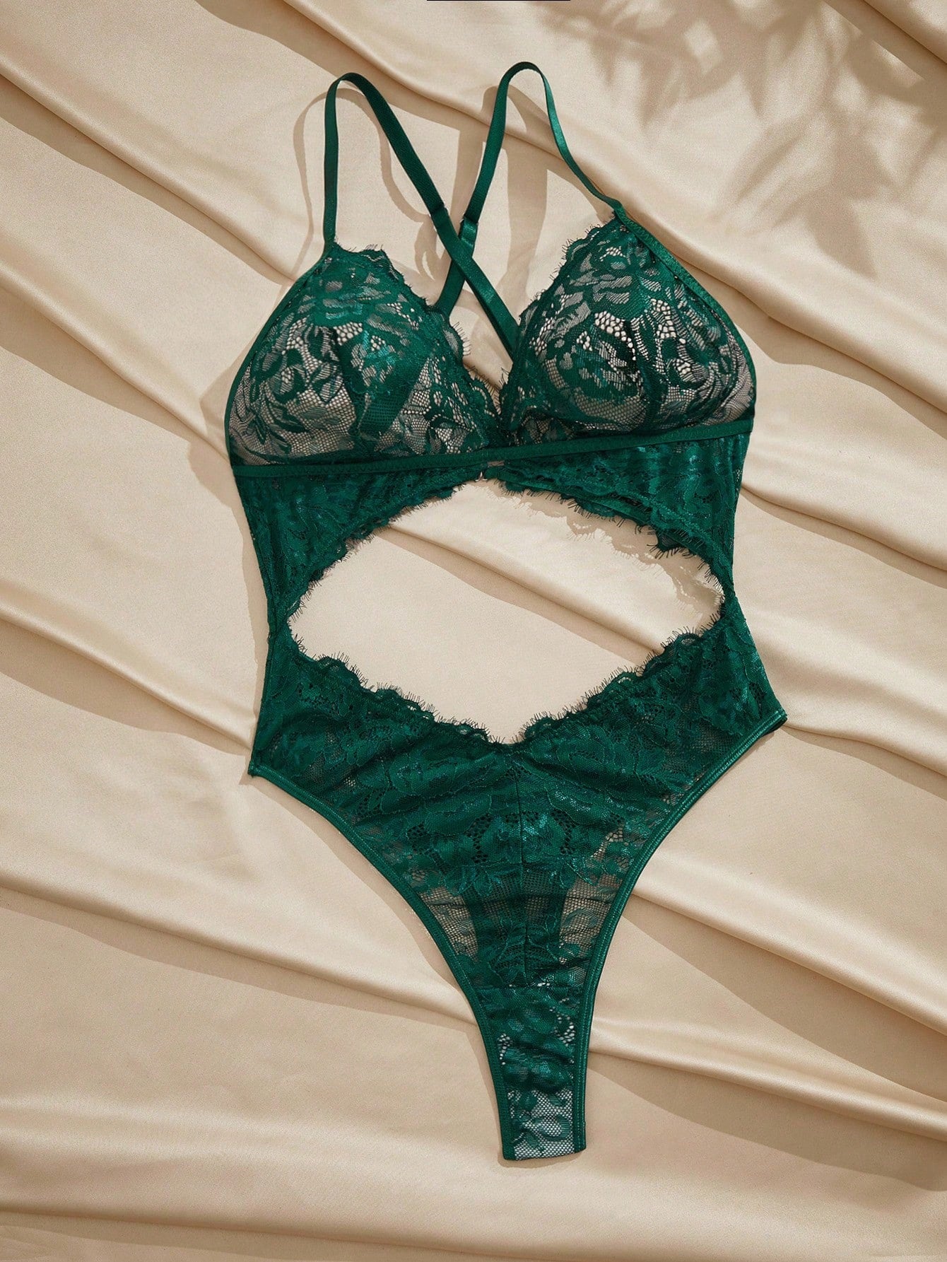 Dark green women’s lace teddy bodysuit set featuring spaghetti straps, backless criss-cross detailing, cut-out accents, and a thong-style high-rise bottom; semi-sheer lace with adjustable straps and wireless bralette support.