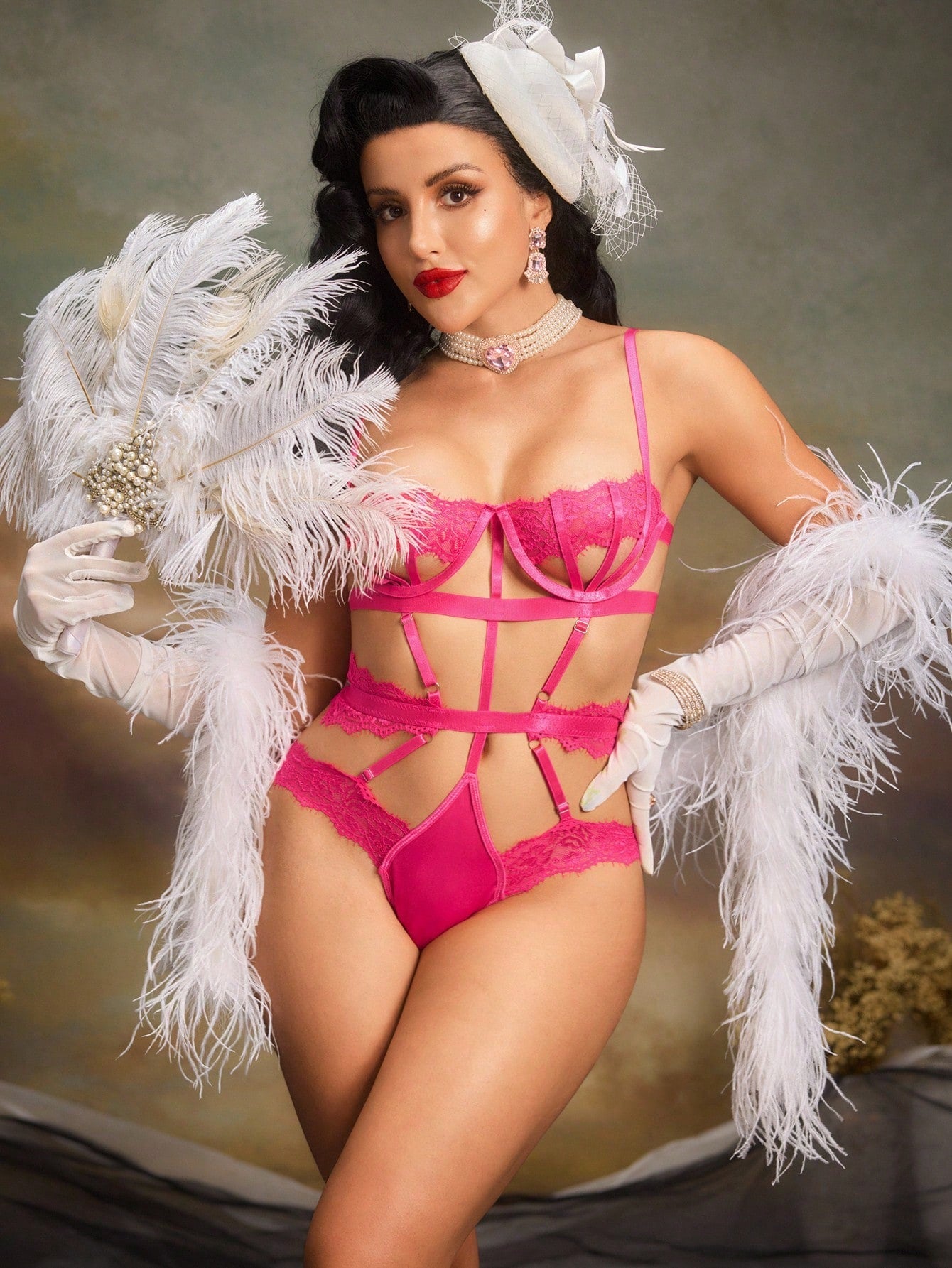 Women's lace splice bodysuit lingerie set with cut-out details, adjustable spaghetti straps, underwire full cups, high-rise thong bottom, and classic sexy styling.